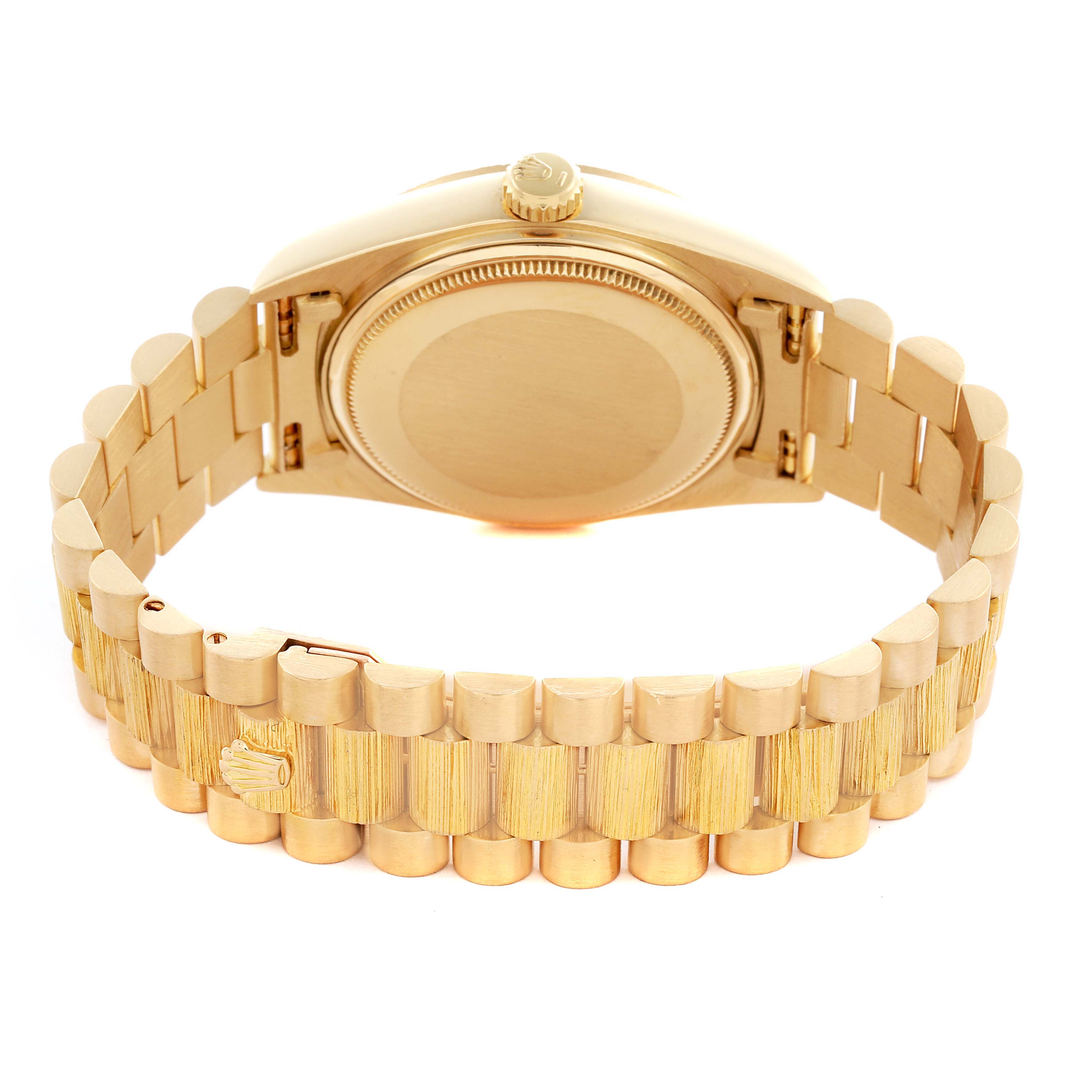 The image shows the back case and bracelet of a Rolex President 18078 Men
s Yellow Gold Brown Dial 18078 Men
s Yellow Gold Brown Dial watch from a top rear angle.