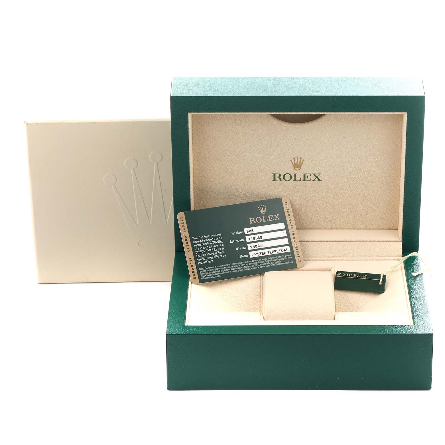 The image shows the open box and accessories for a Rolex President 118388 Men's Yellow Gold Mother of Pearl Dial 118388 Men's Yellow Gold Mother of Pearl Dial model, featuring a certificate card and tags inside.