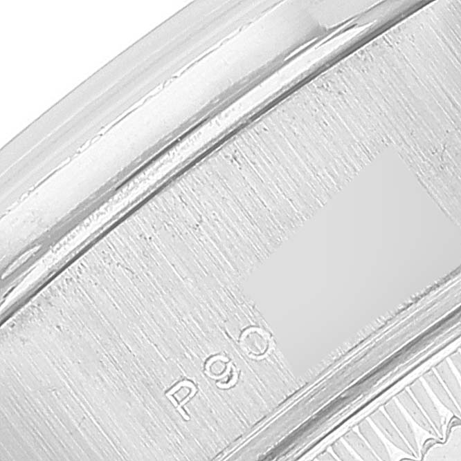This close-up image shows part of the band and engraving on a Rolex President 79159 Women's White Gold Silver Dial 79159 Women's White Gold Silver Dial model watch.
