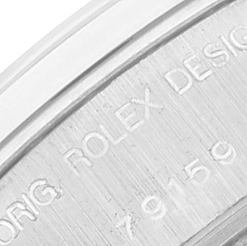The image shows a close-up of the engraved markings on the side of the Rolex President 79159 Women's White Gold Silver Dial 79159 Women's White Gold Silver Dial model watch.