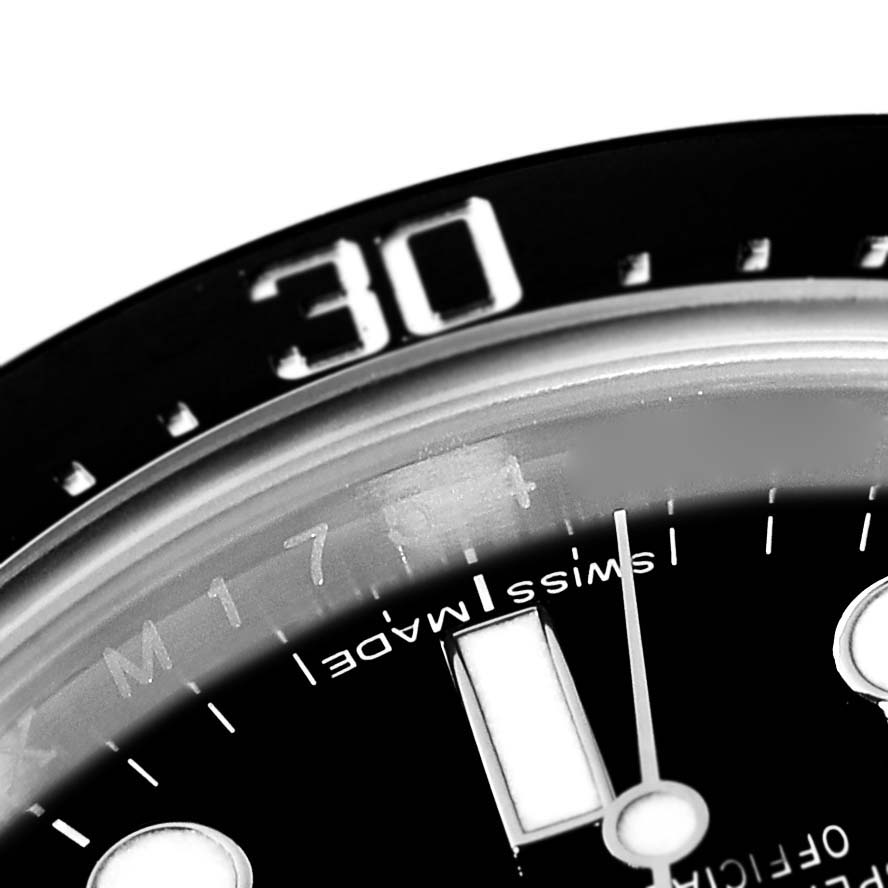 This close-up image shows the bezel and a portion of the dial of the Rolex Sea-Dweller 116600 Men's Stainless Steel Black Dial 116600 Men's Stainless Steel Black Dial watch, including the "30" marker.