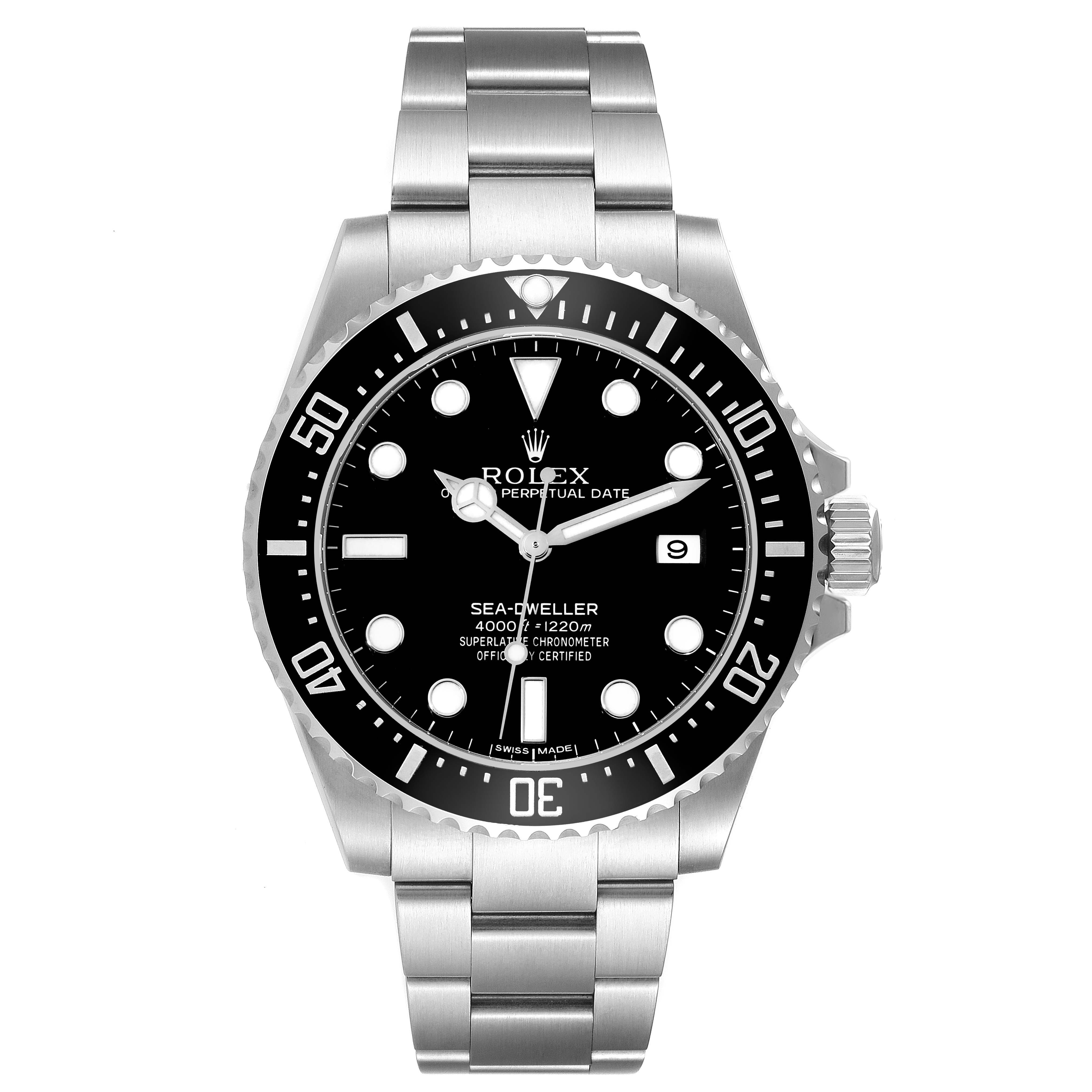 The Rolex Sea-Dweller model 116600 is shown from a front angle, featuring its black dial, unidirectional bezel, stainless steel bracelet, and date window.