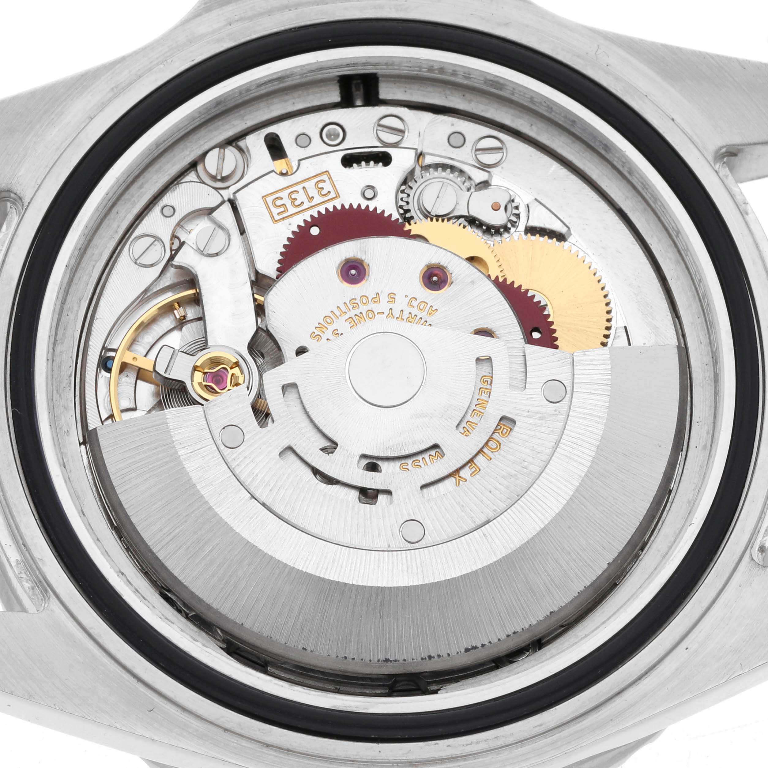 The image shows the back of a Rolex Sea-Dweller 16600 Men's Stainless Steel Black Dial 16600 Men's Stainless Steel Black Dial, revealing its mechanical movement and intricate internal parts.