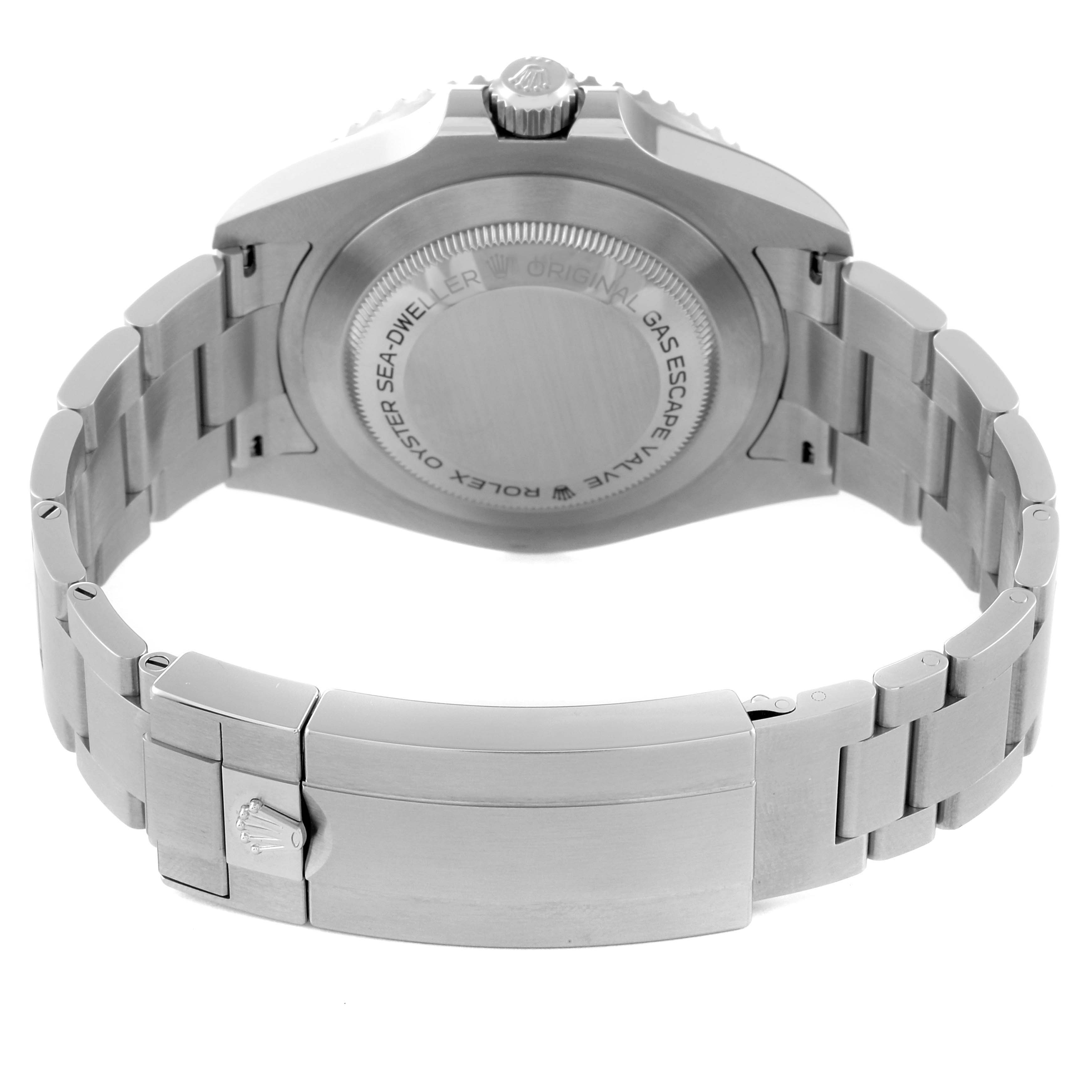 This image displays the back case, crown, and bracelet clasp of a Rolex Sea-Dweller 126600 Men
s Stainless Steel Black Dial 126600 Men
s Stainless Steel Black Dial watch from a rear angle.