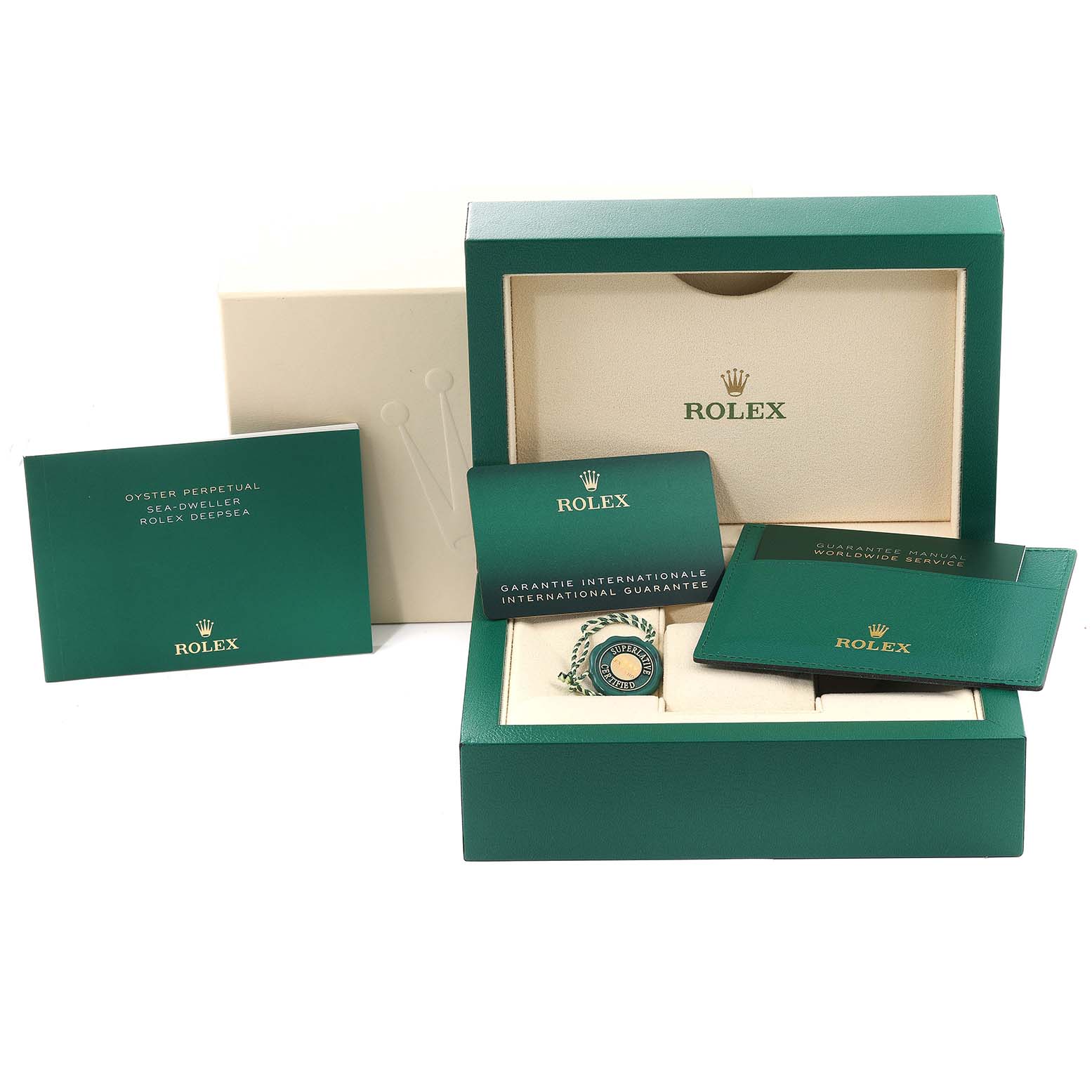 The image shows the packaging, warranty card, manual, and accessories for the Rolex Sea-Dweller 126600 Men
s Stainless Steel Black Dial 126600 Men
s Stainless Steel Black Dial watch.