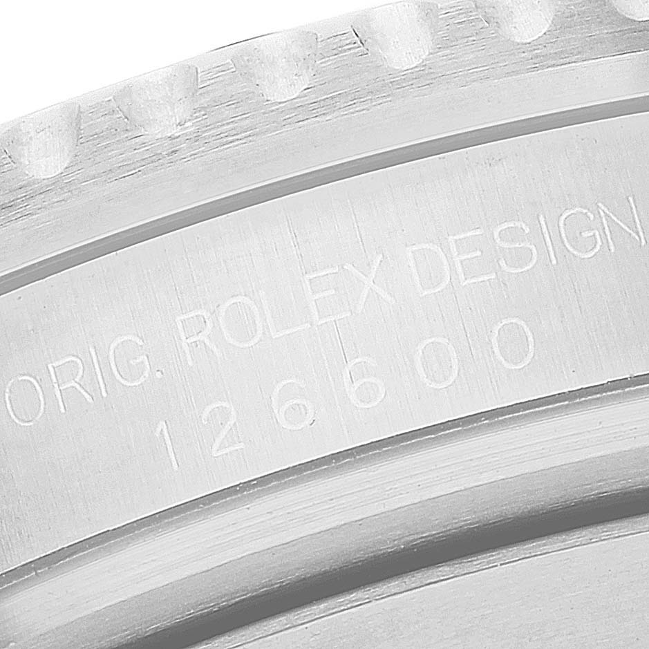 This image shows a close-up of the engraved model number on the bezel of a Rolex Sea-Dweller 126600 Men
s Stainless Steel Black Dial 126600 Men
s Stainless Steel Black Dial watch.