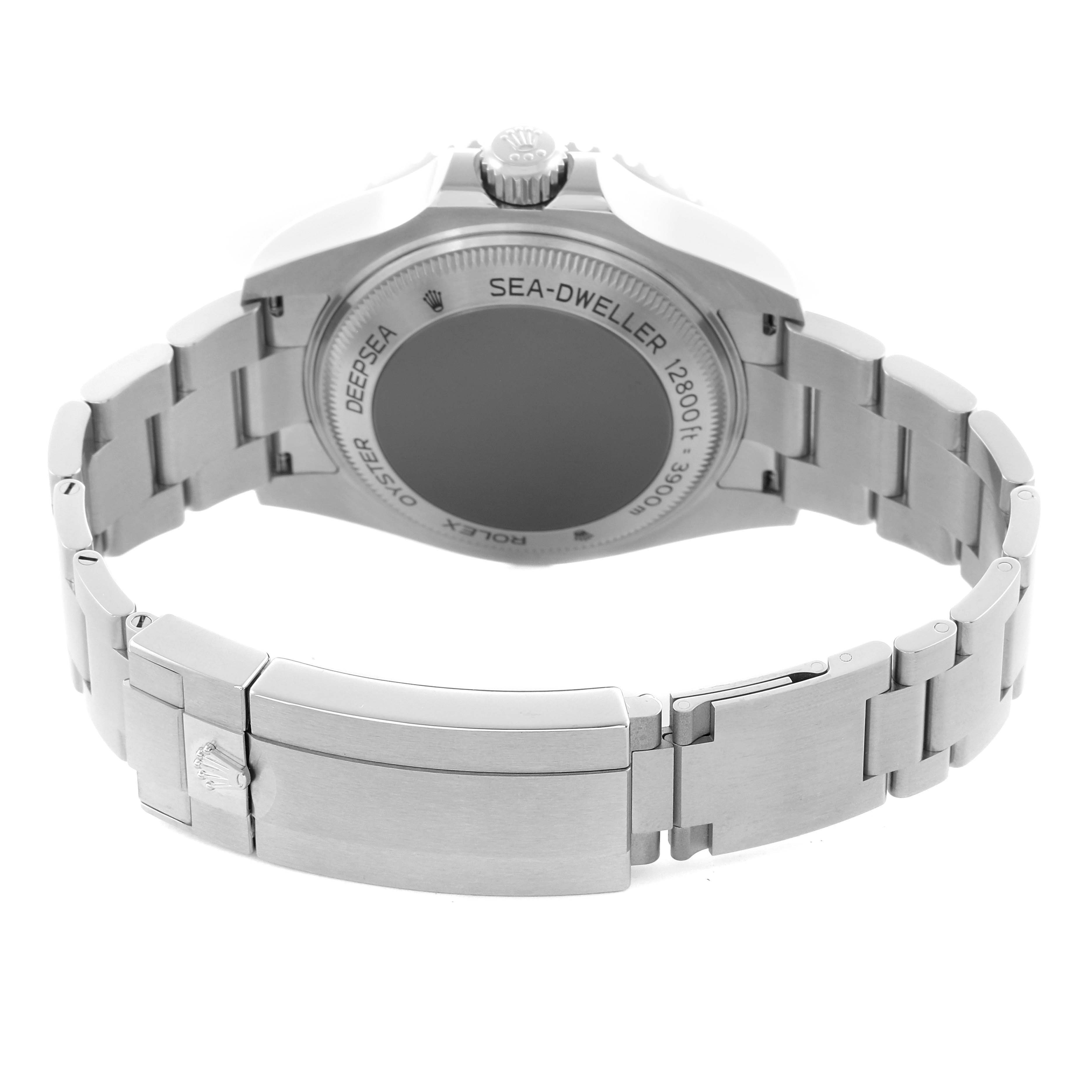 The image shows the back and bracelet of a Rolex Sea-Dweller 126660 Men's Stainless Steel Black Dial 126660 Men's Stainless Steel Black Dial watch, including the clasp and case back with engravings.