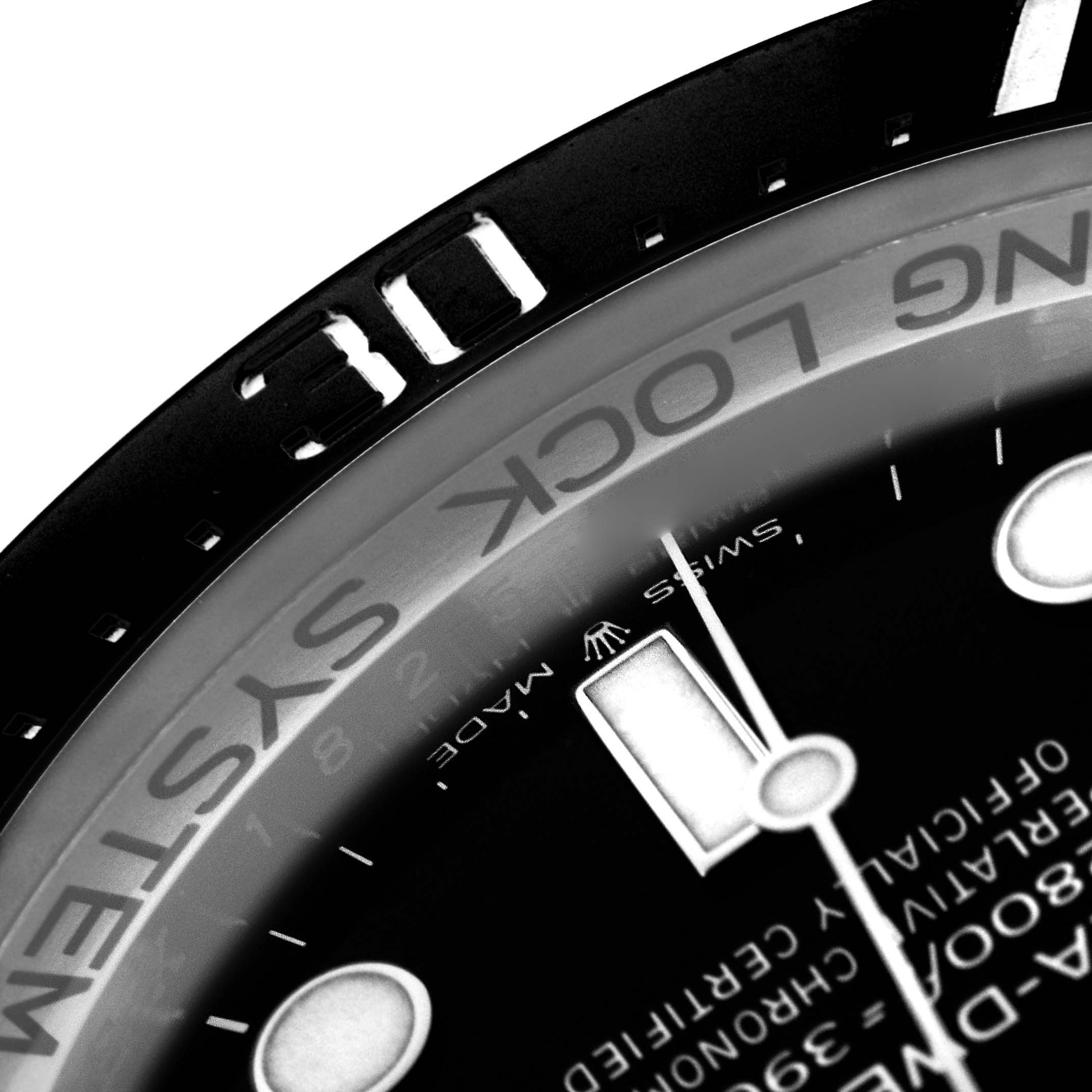 The image shows a close-up of the Rolex Sea-Dweller 126660 Men's Stainless Steel Black Dial 126660 Men's Stainless Steel Black Dial watch, focusing on the bezel and part of the dial with markers and text.