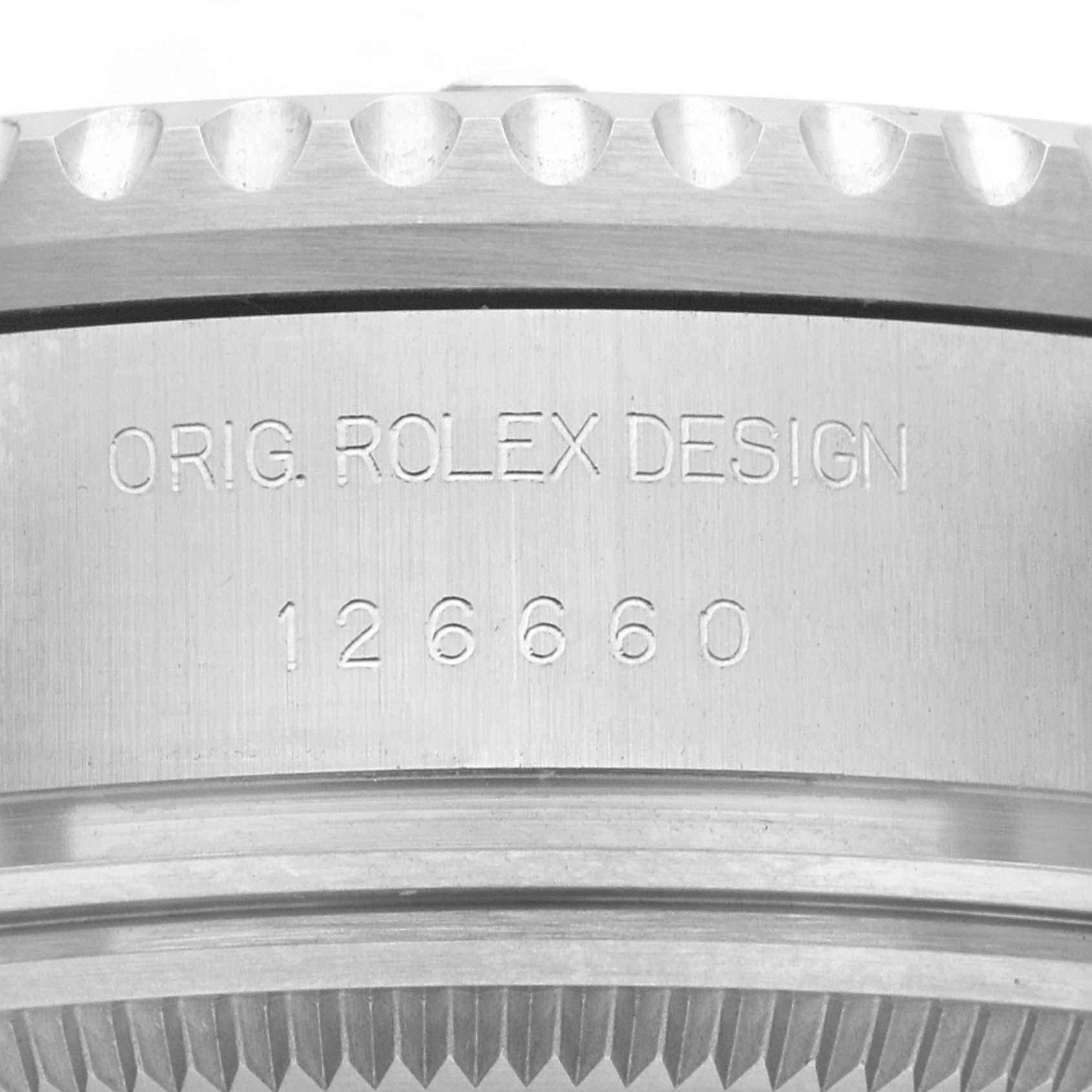 The image shows a close-up of the engraved side of the Rolex Sea-Dweller 126660 Men's Stainless Steel Black Dial 126660 Men's Stainless Steel Black Dial watch, featuring the model number and design text.