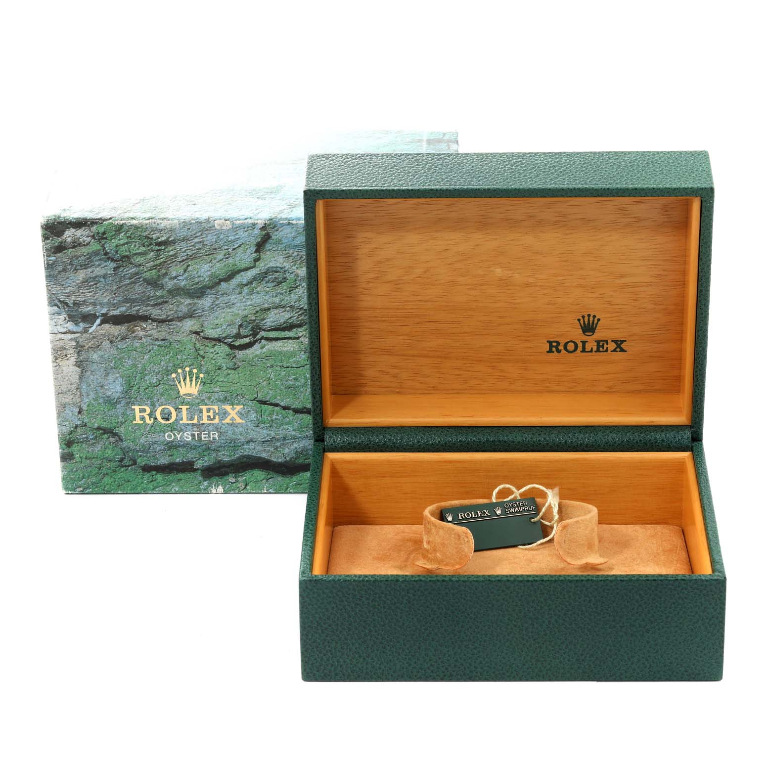 This image shows the open box and packaging for a Rolex Submariner 14060M Men
s Stainless Steel Black Dial 14060M Men
s Stainless Steel Black Dial, with the watch absent.