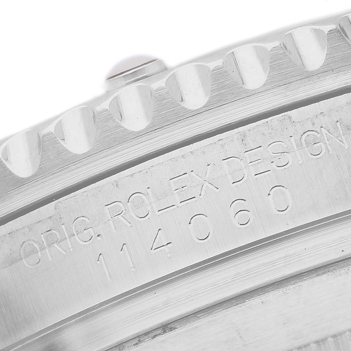 The image shows a close-up of the side of a Rolex Submariner 114060 Men's Stainless Steel Black Dial watch, highlighting the engraved model number.