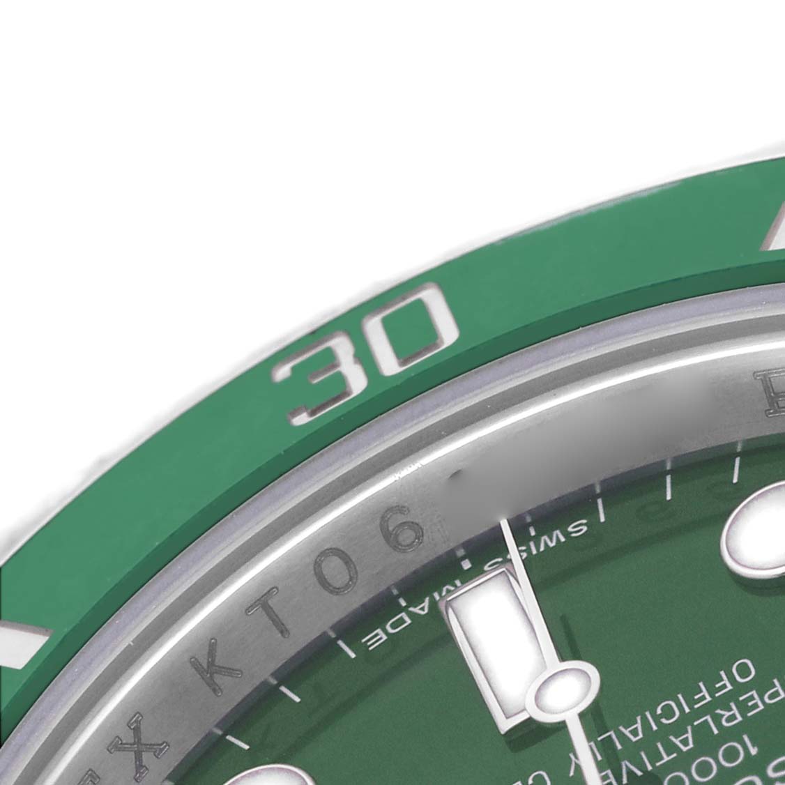 The image shows a close-up of the bezel and part of the dial of a Rolex Submariner 116610LV Men's Stainless Steel Green Dial, highlighting the "30" marker on the green bezel.
