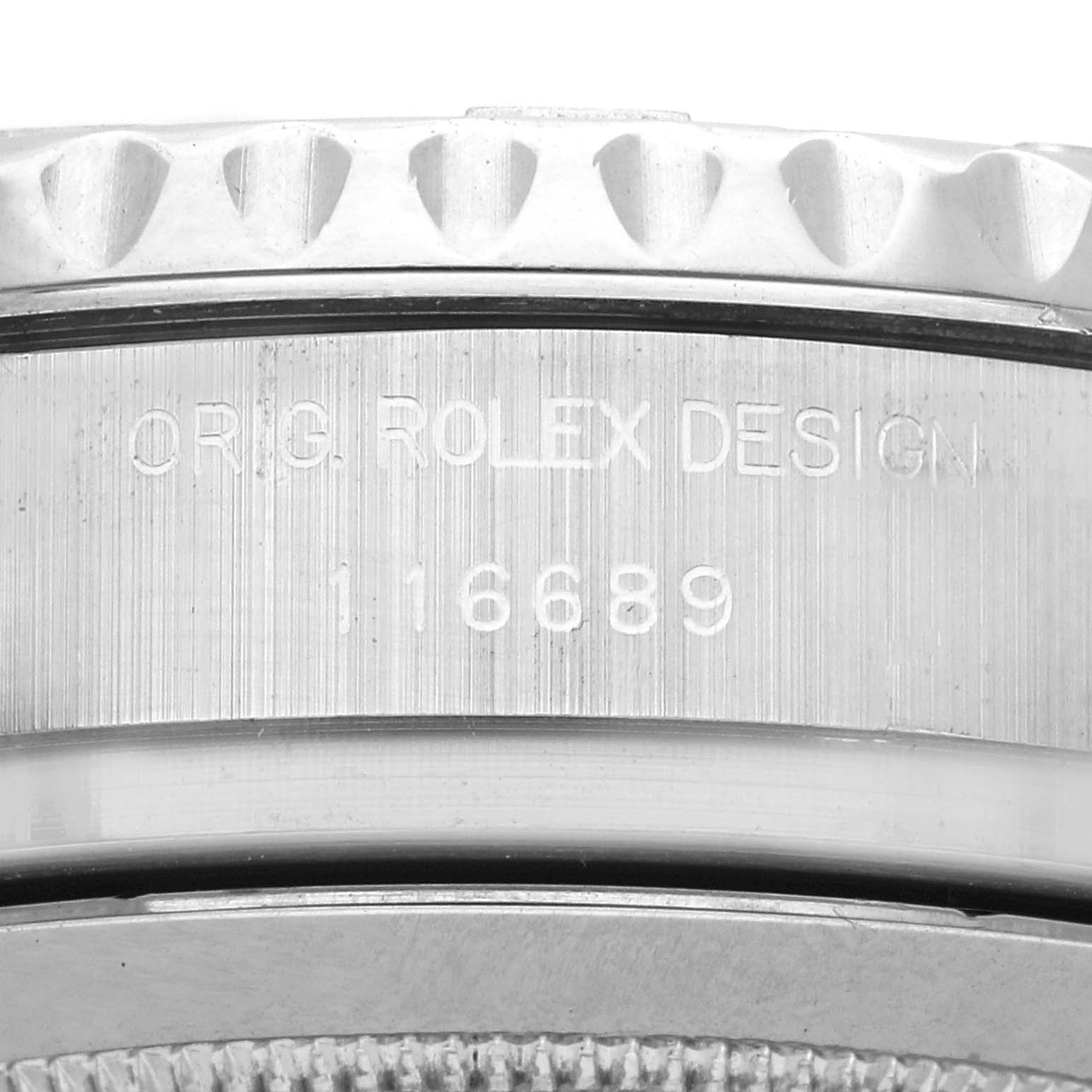The image shows an angled close-up of the side of a Rolex Yacht-Master 116689 Men
s Platinum White Dial 116689 Men
s Platinum White Dial watch, highlighting the engraved design number.