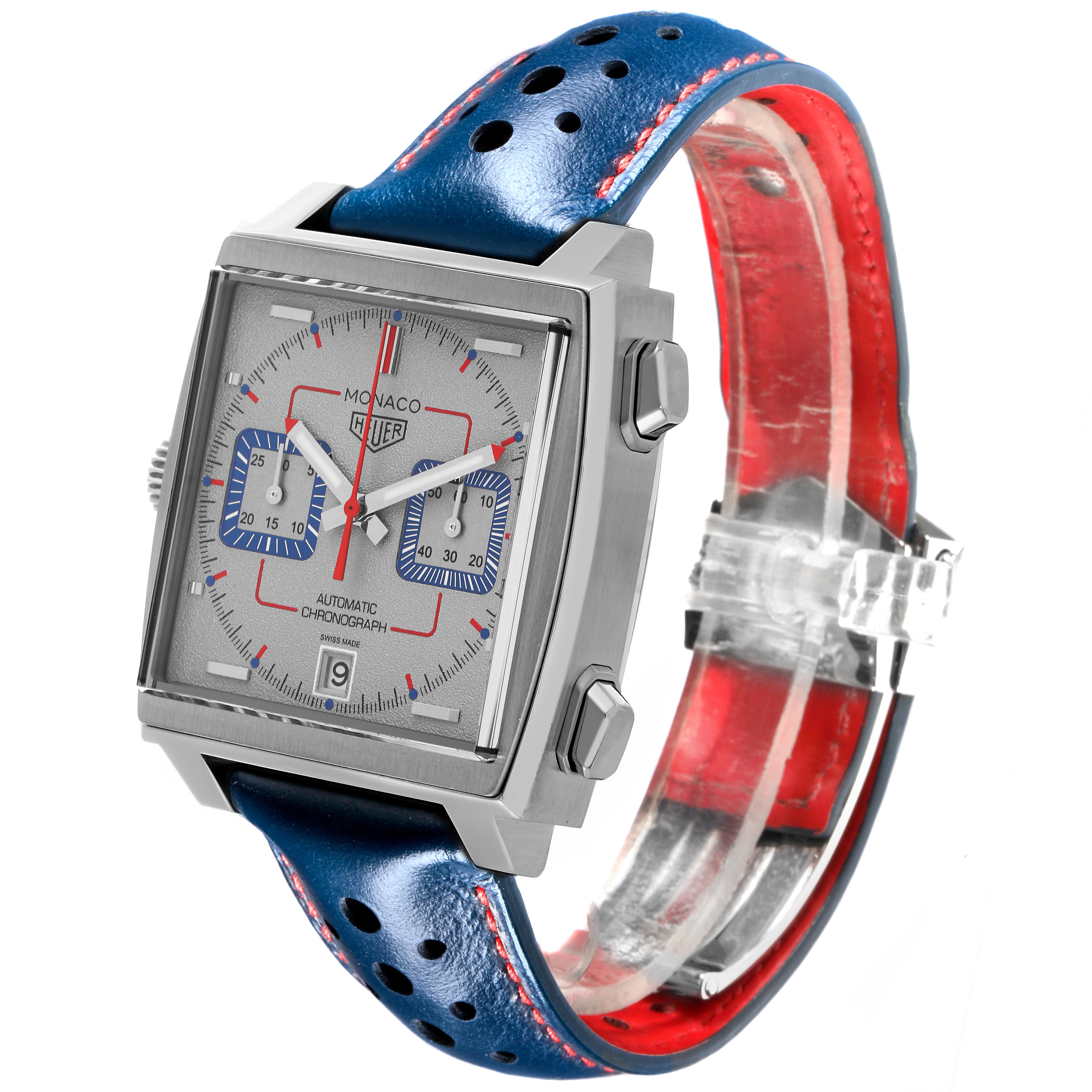 The Tag Heuer Monaco CAW211X.FC6468 Men's Stainless Steel Grey Dial CAW211X.FC6468 Men's Stainless Steel Grey Dial watch is shown at a slight angle, displaying the face, crown, pushers, and perforated blue strap.