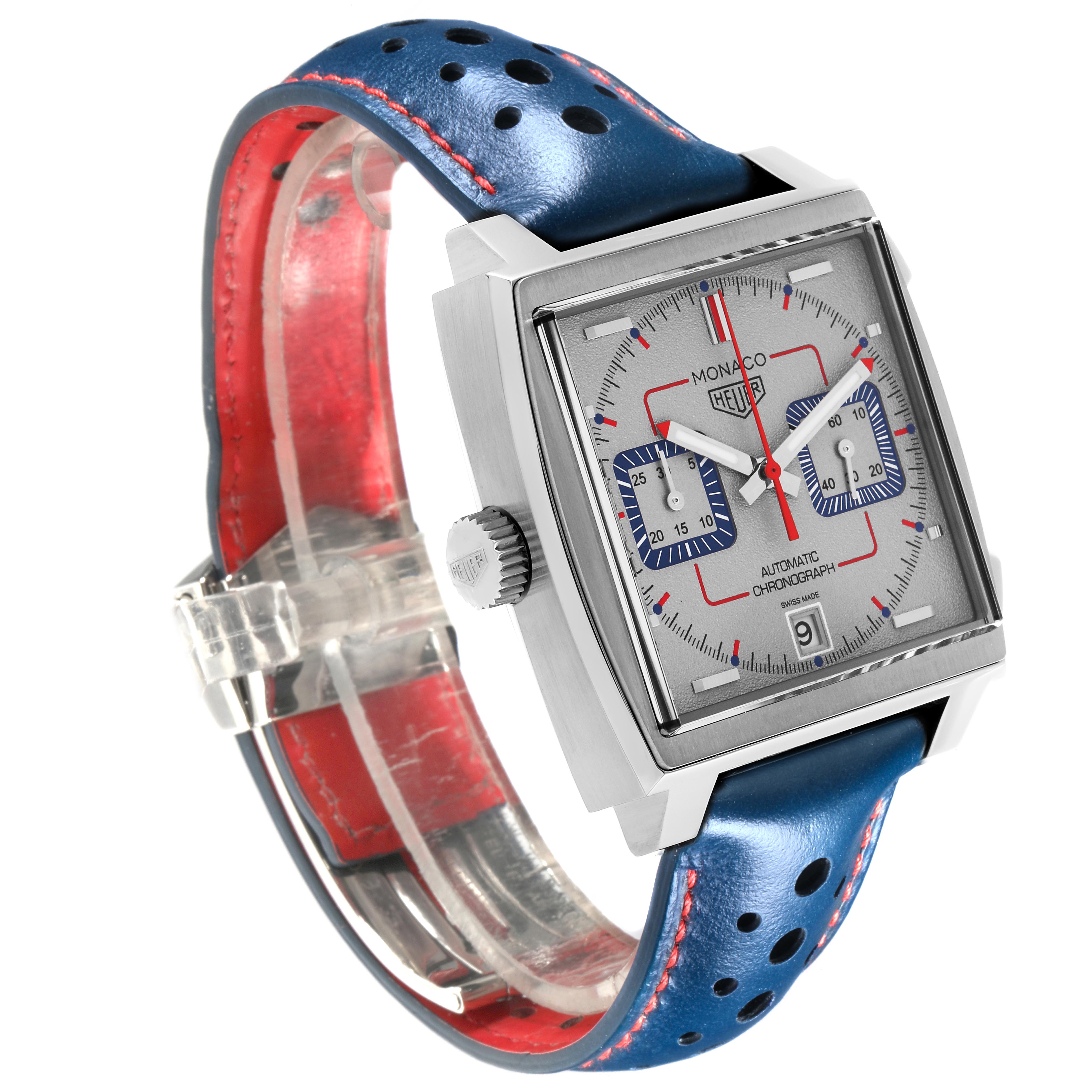 The Tag Heuer Monaco CAW211X.FC6468 Men's Stainless Steel Grey Dial CAW211X.FC6468 Men's Stainless Steel Grey Dial watch is shown at an angled view, highlighting its square face, crown, and perforated blue leather strap.