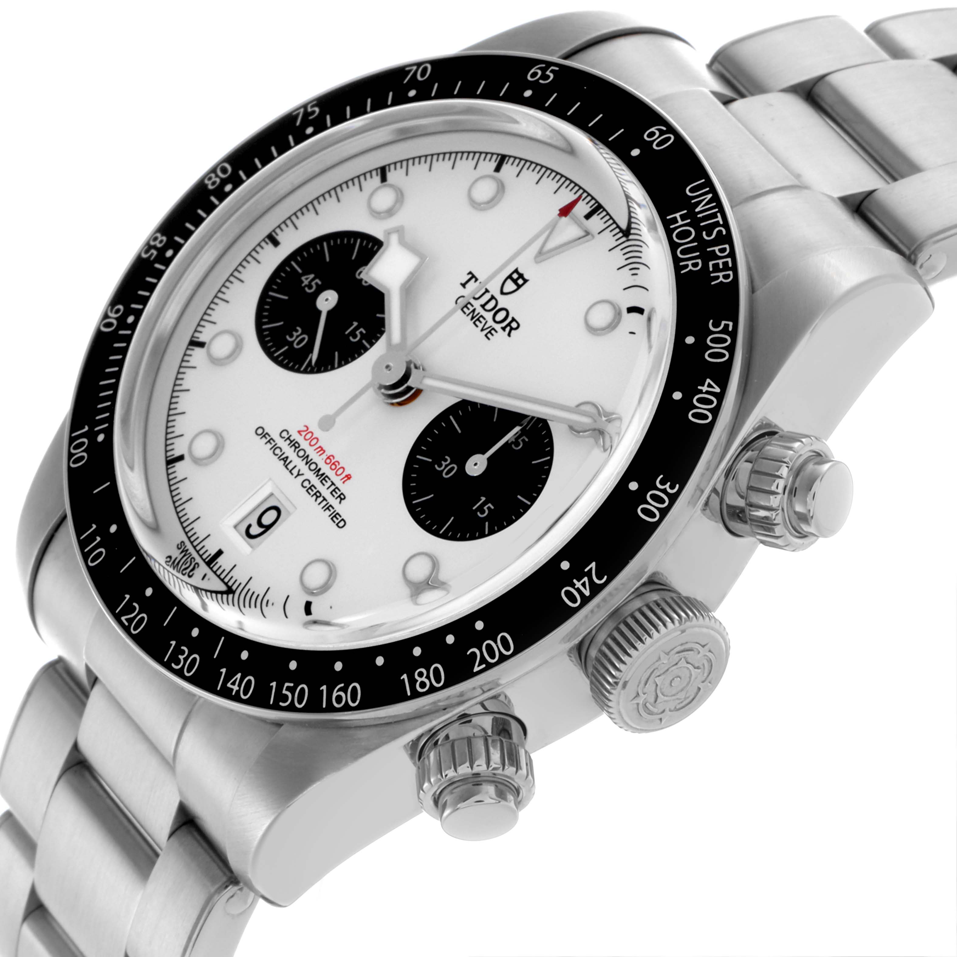 The Tudor Heritage Black Bay 79360N Men's Stainless Steel Silver Dial 79360N Men's Stainless Steel Silver Dial watch is shown from an angled side view, displaying the crown, bezel, and bracelet.