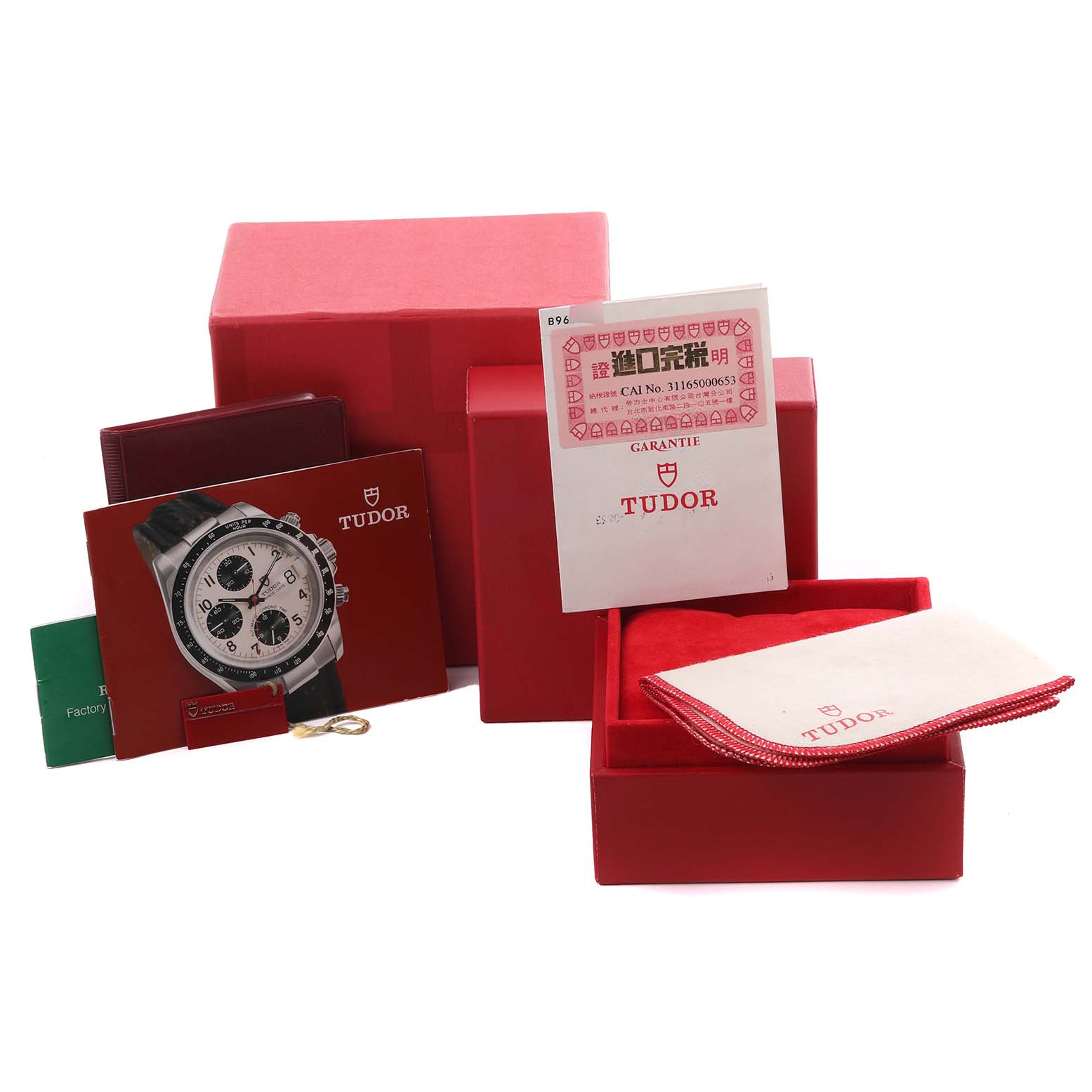 The image showcases the Tudor Tiger 79280 Men's Stainless Steel Red Dial 79280 Men's Stainless Steel Red Dial watch packaging, including boxes, warranty cards, and a cleaning cloth.