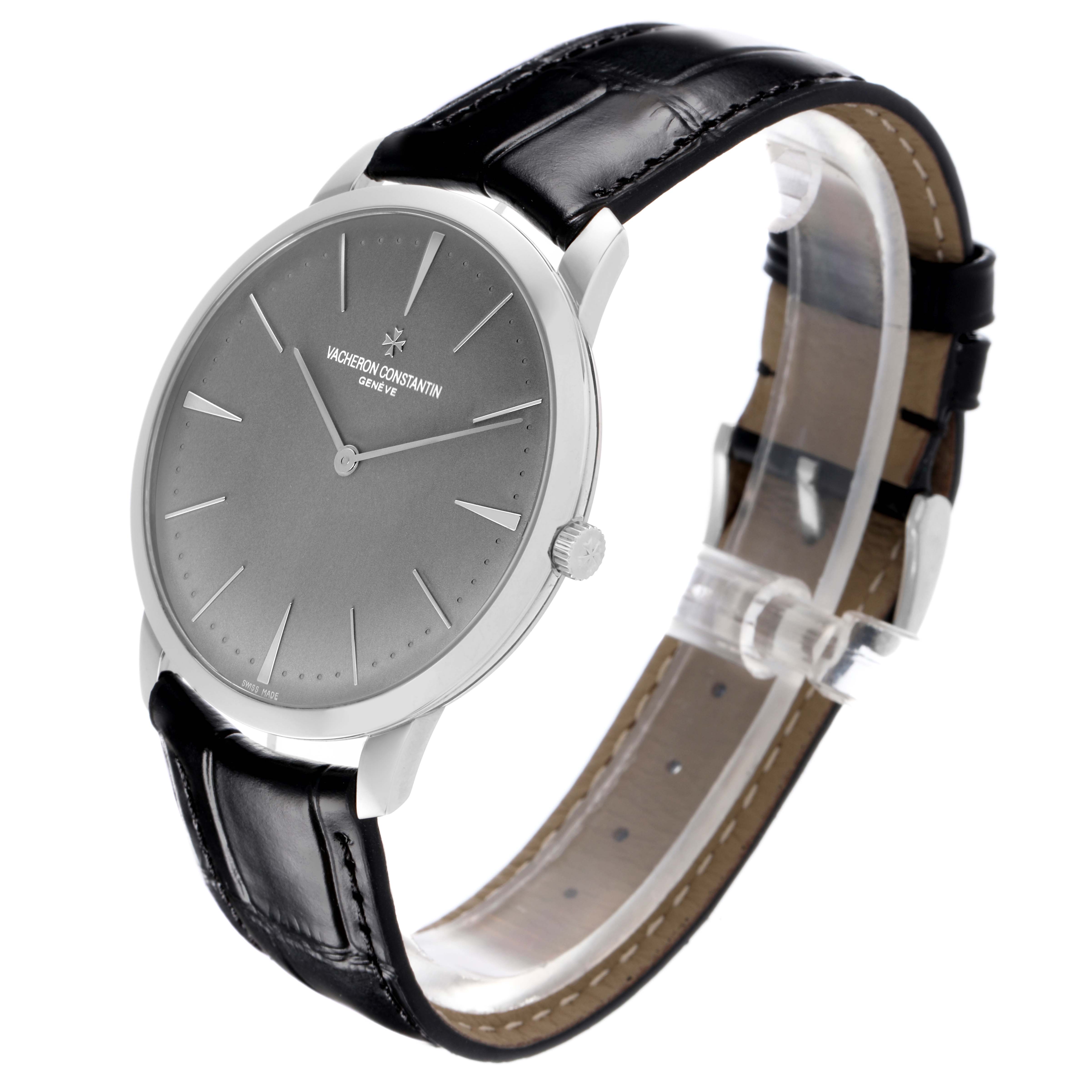 The Vacheron Constantin Patrimony 81180/000P-9539 Men's Platinum Grey Dial 81180/000P-9539 Men's Platinum Grey Dial watch is shown at a three-quarter angle, highlighting the dial, case, crown, and leather strap.
