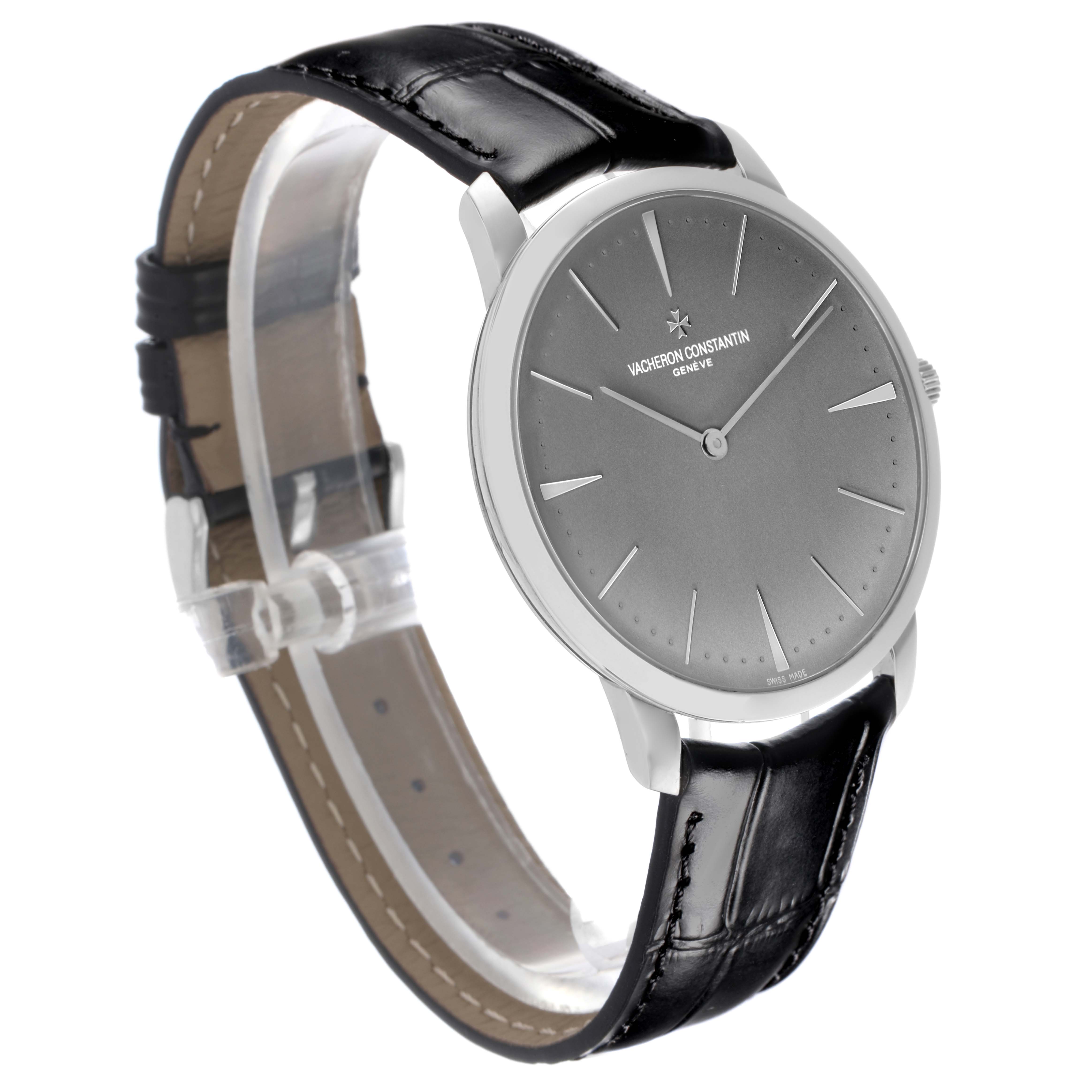 The Vacheron Constantin Patrimony 81180/000P-9539 Men's Platinum Grey Dial 81180/000P-9539 Men's Platinum Grey Dial watch is shown at an angled side view, displaying the face, case, and black leather strap.