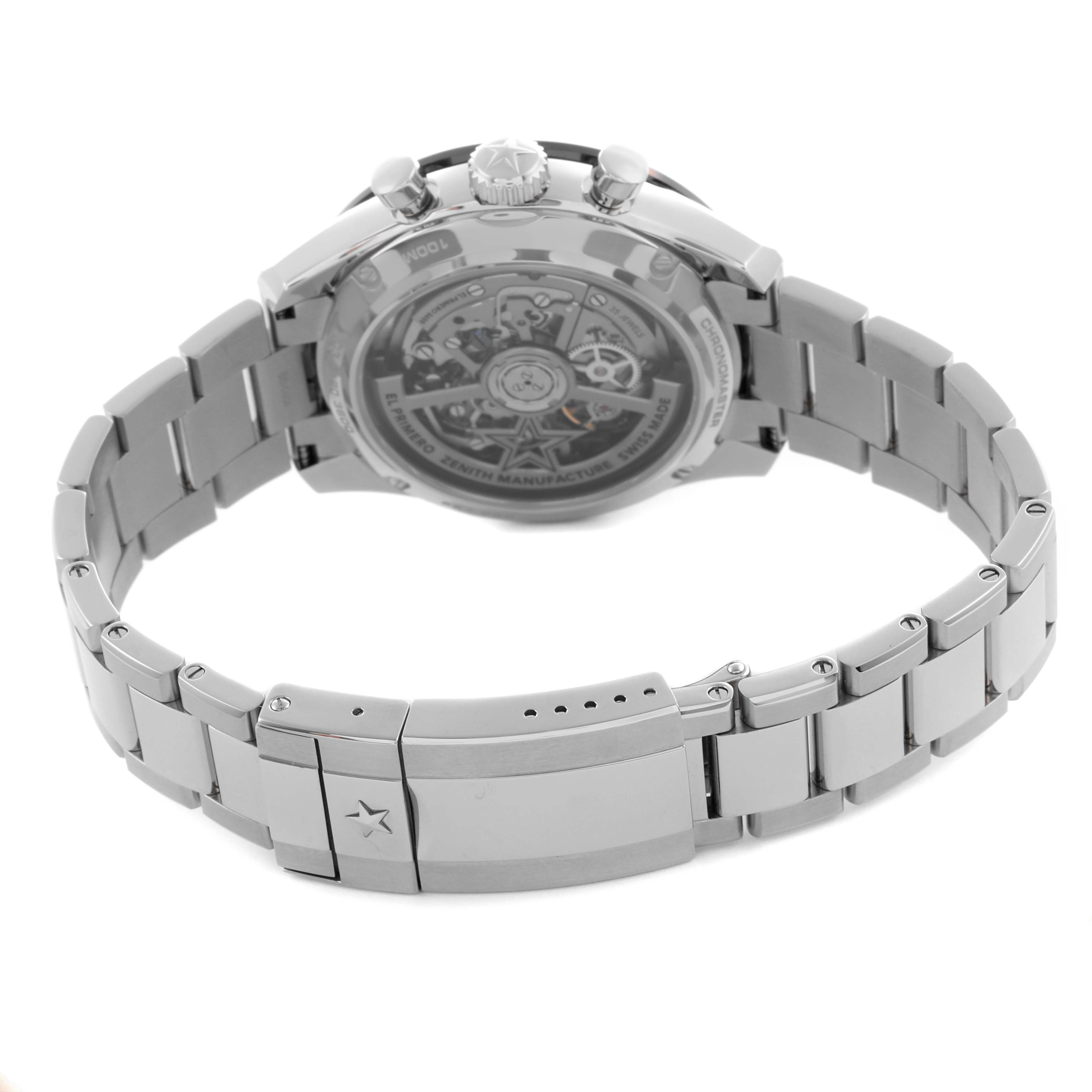 The Zenith Chronomaster 03.3120.3600/76.M3100 Men
s Stainless Steel Silver Dial 03.3120.3600/76.M3100 Men
s Stainless Steel Silver Dial watch is shown from the rear, highlighting the exhibition case back and metal bracelet with clasp.