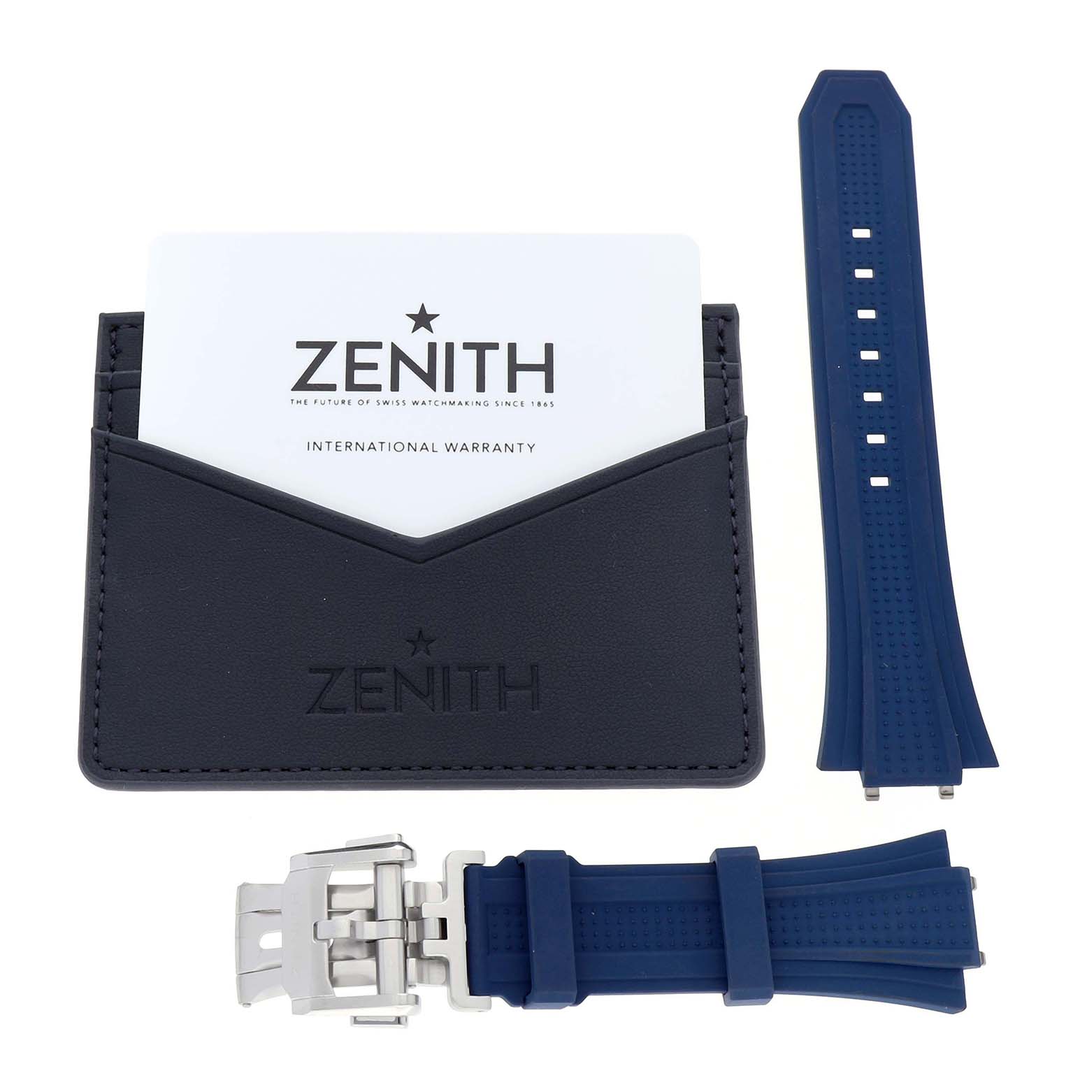 The image shows a Zenith Defy 03.9300.3620 Men's Stainless Steel Blue Dial model watch strap in blue with buckle, and a warranty card in a branded sleeve.