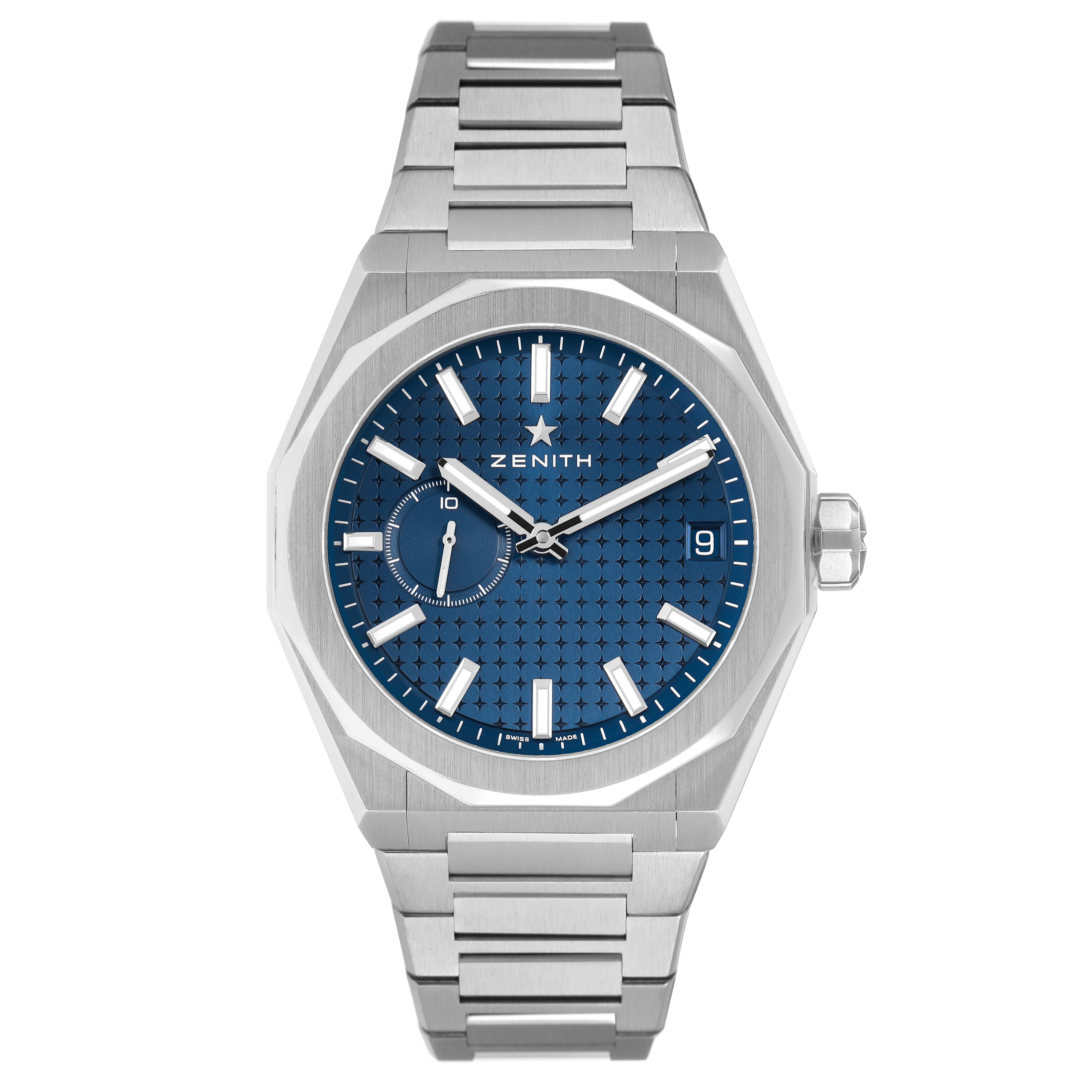 The Zenith Defy 03.9300.3620 Men's Stainless Steel Blue Dial watch is shown from a frontal angle, highlighting the blue dial, hour markers, hands, bracelet, and crown.