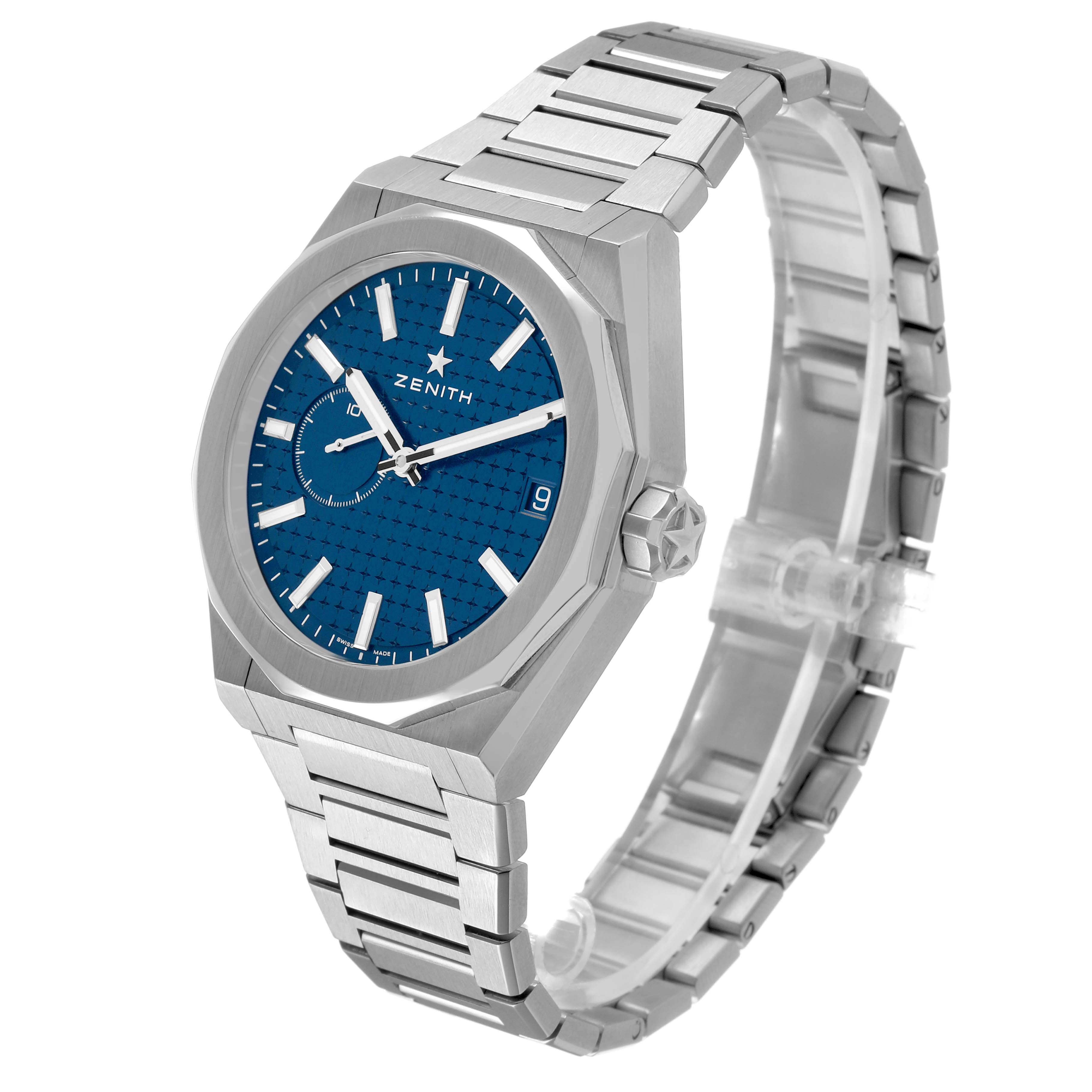 The Zenith Defy 03.9300.3620 Men's Stainless Steel Blue Dial watch is shown at a three-quarter angle, highlighting the blue dial, case, and stainless steel bracelet.