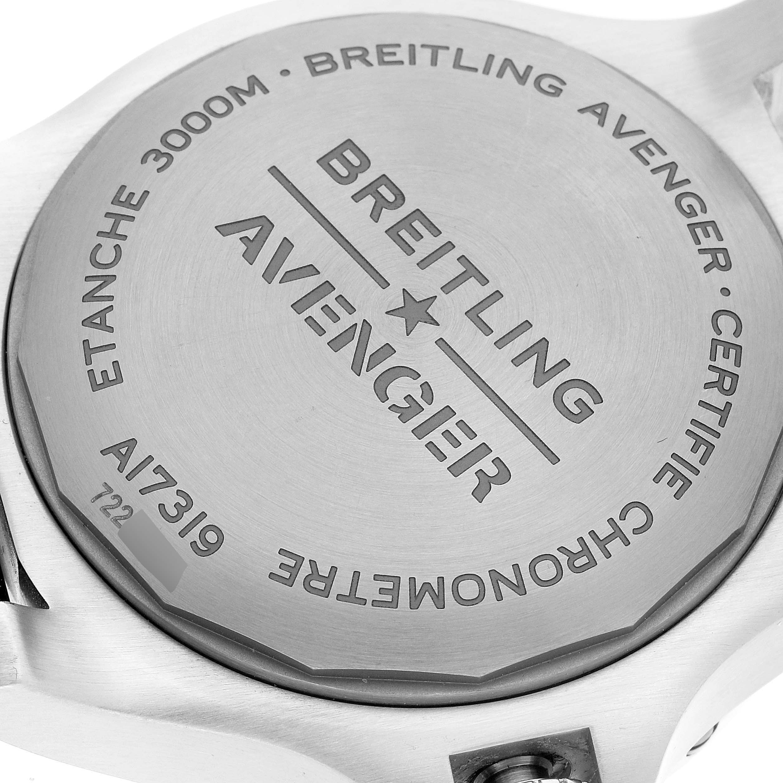 The image shows the case back of the Breitling Avenger A17319 Men's Stainless Steel Yellow Dial A17319 Men's Stainless Steel Yellow Dial model watch, highlighting the engravings and specifications.