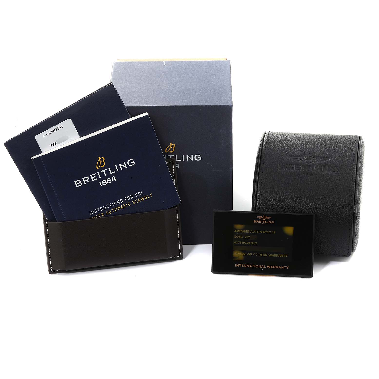 The image shows the packaging materials, manuals, and warranty card for the Breitling Avenger A17319 Men's Stainless Steel Yellow Dial A17319 Men's Stainless Steel Yellow Dial model watch.