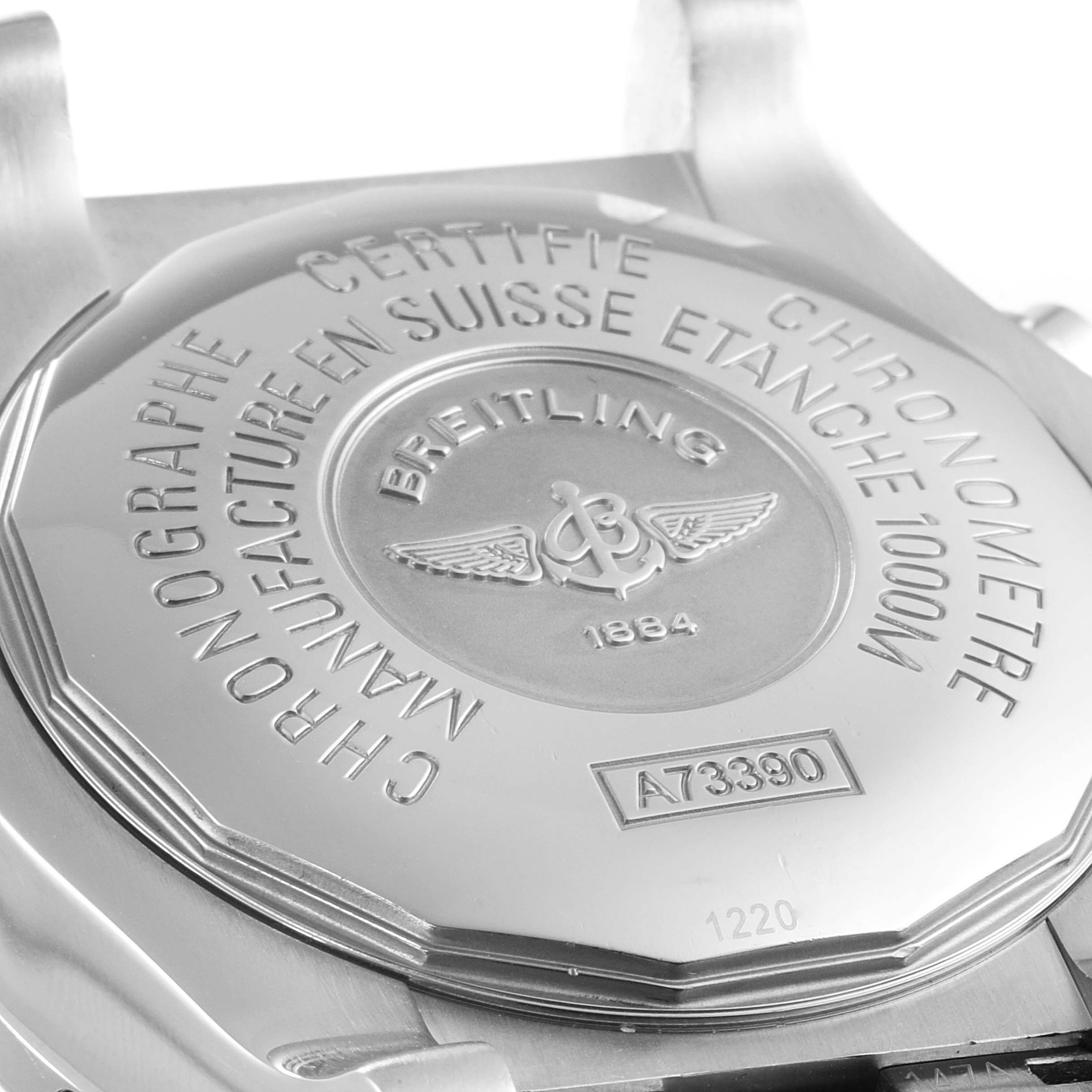 The image shows the back case of a Breitling Avenger A73390 Men's Stainless Steel Blue Dial A73390 Men's Stainless Steel Blue Dial watch, with model and brand engravings.