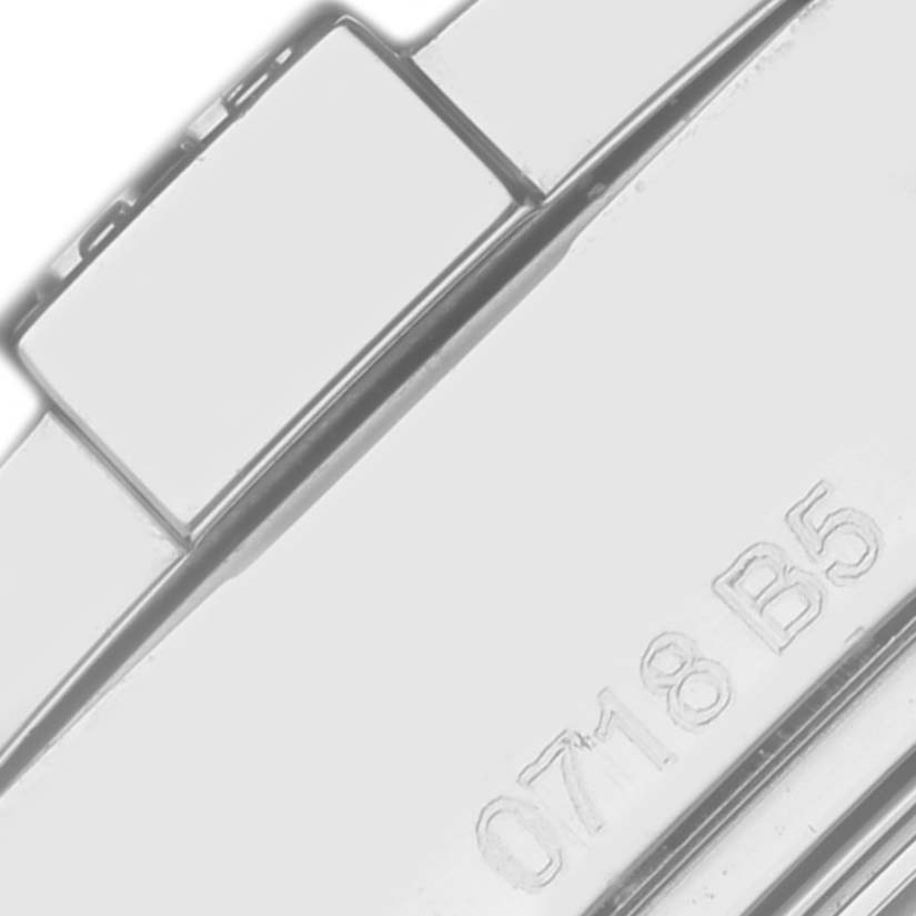 The image shows a close-up of the bracelet of a Breitling Colt A7338811/BD43 Men's Stainless Steel Black Dial A7338811/BD43 Men's Stainless Steel Black Dial watch, featuring a clasp and visible serial numbers.