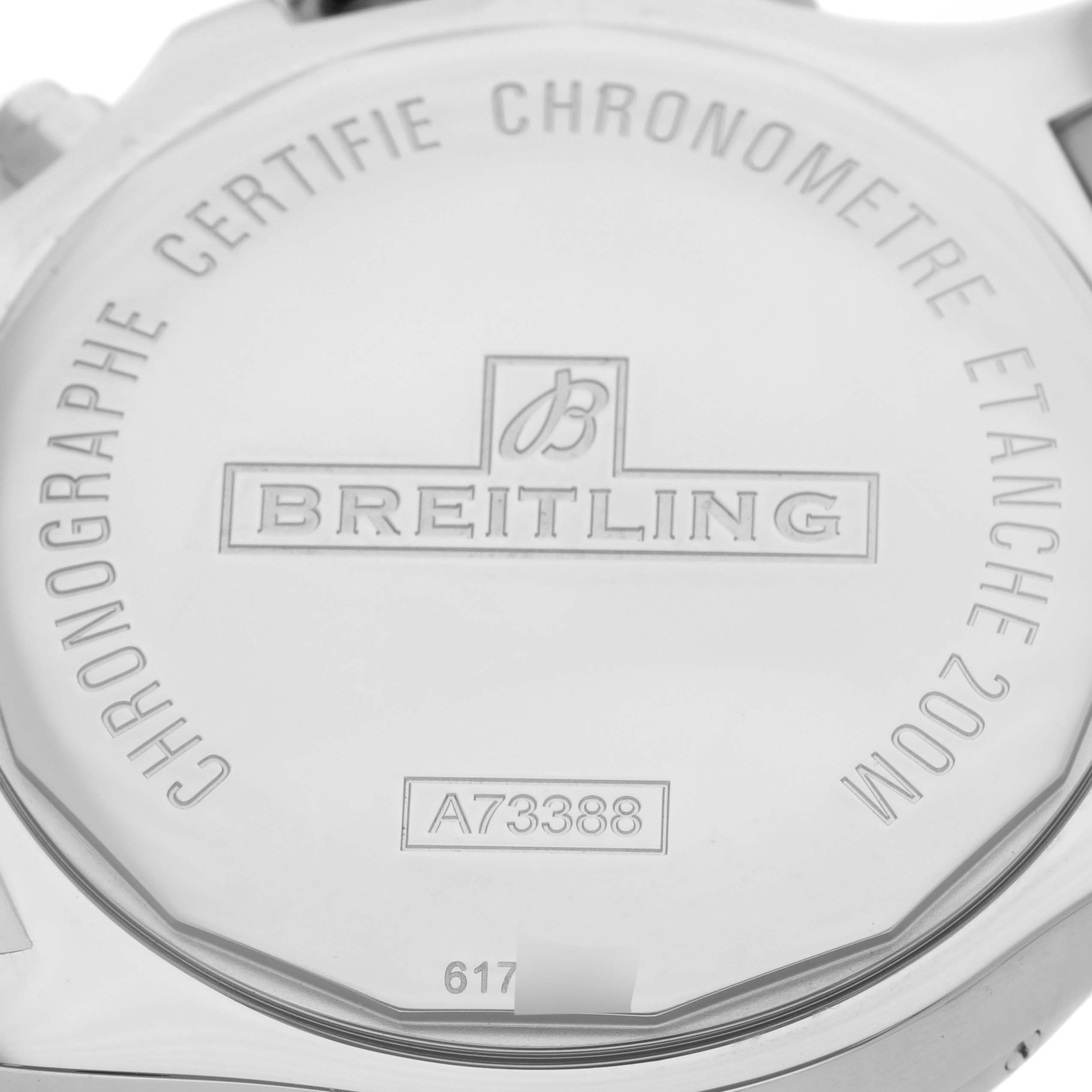 The image shows the back case of a Breitling Colt A7338811/BD43 Men's Stainless Steel Black Dial A7338811/BD43 Men's Stainless Steel Black Dial watch, displaying engravings including the brand logo and model number.