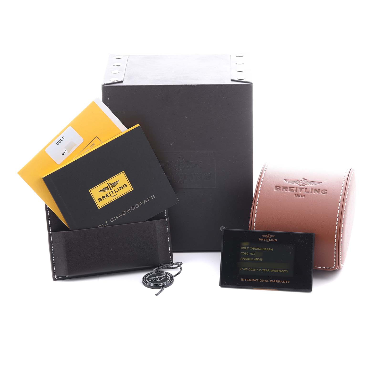 The image shows Breitling Colt A7338811/BD43 Men's Stainless Steel Black Dial A7338811/BD43 Men's Stainless Steel Black Dial watch accessories, including a box, manuals, warranty card, and leather case from an angled top view.