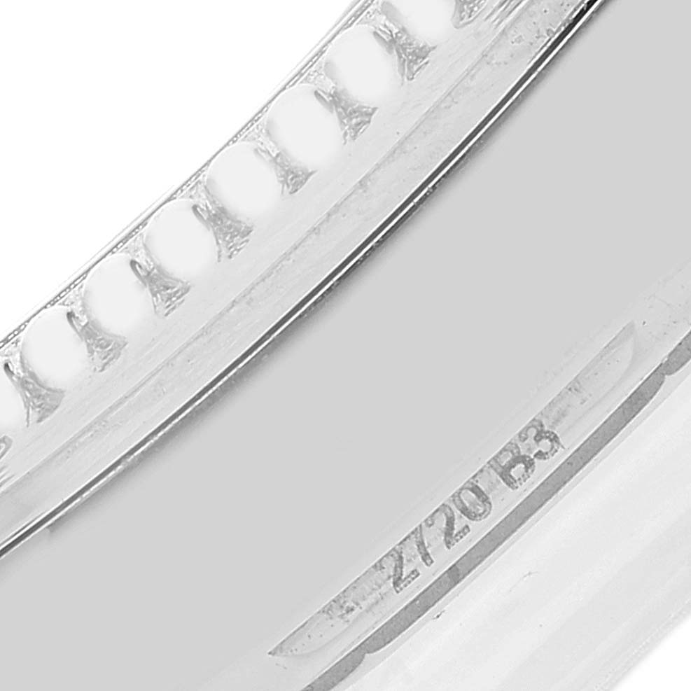 This close-up angle shows the edge detailing of the bezel and the engraving on a Breitling Navitimer A17395 Men's Stainless Steel Blue Dial A17395 Men's Stainless Steel Blue Dial watch.