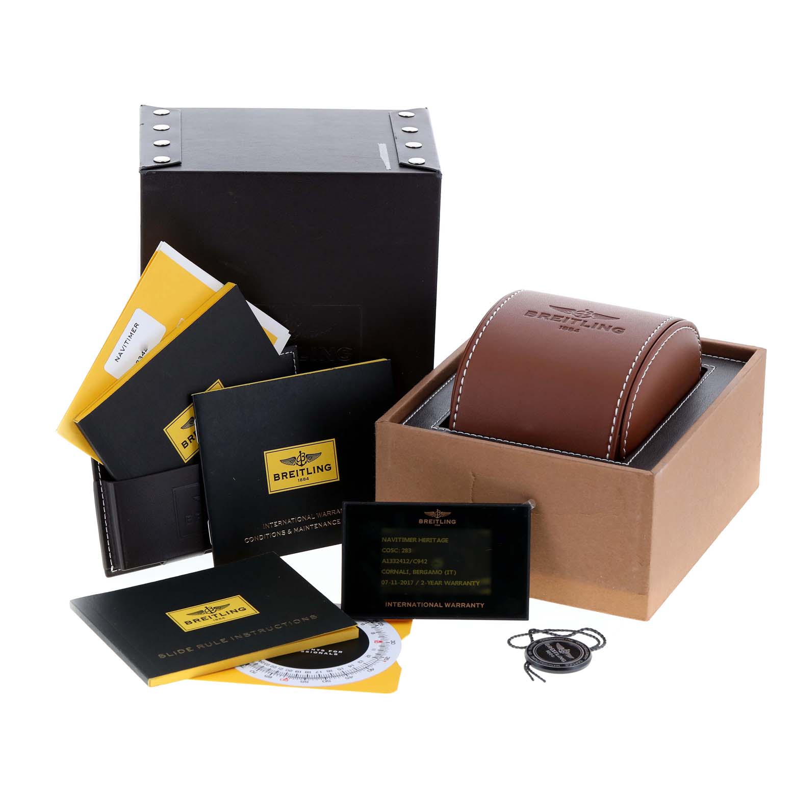 The image shows the packaging, warranty cards, manuals, and a leather case for a Breitling Navitimer A13324 Men
s Stainless Steel Blue Dial A13324 Men
s Stainless Steel Blue Dial watch.