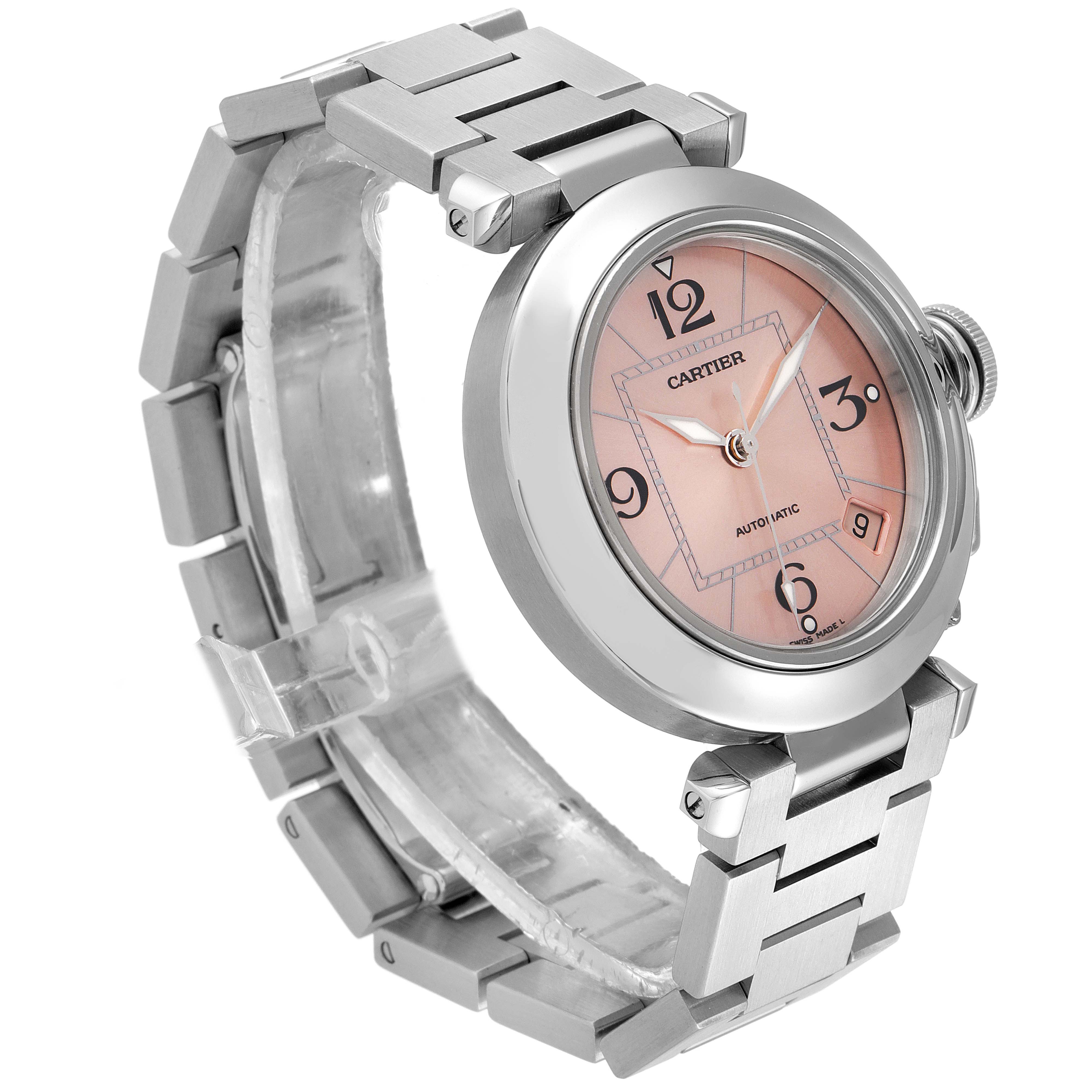 This image shows a Cartier Pasha W31075M7 Women's Stainless Steel Pink Dial W31075M7 Women's Stainless Steel Pink Dial watch with a metal bracelet, pink dial, and partially visible crown, viewed from an angle above.