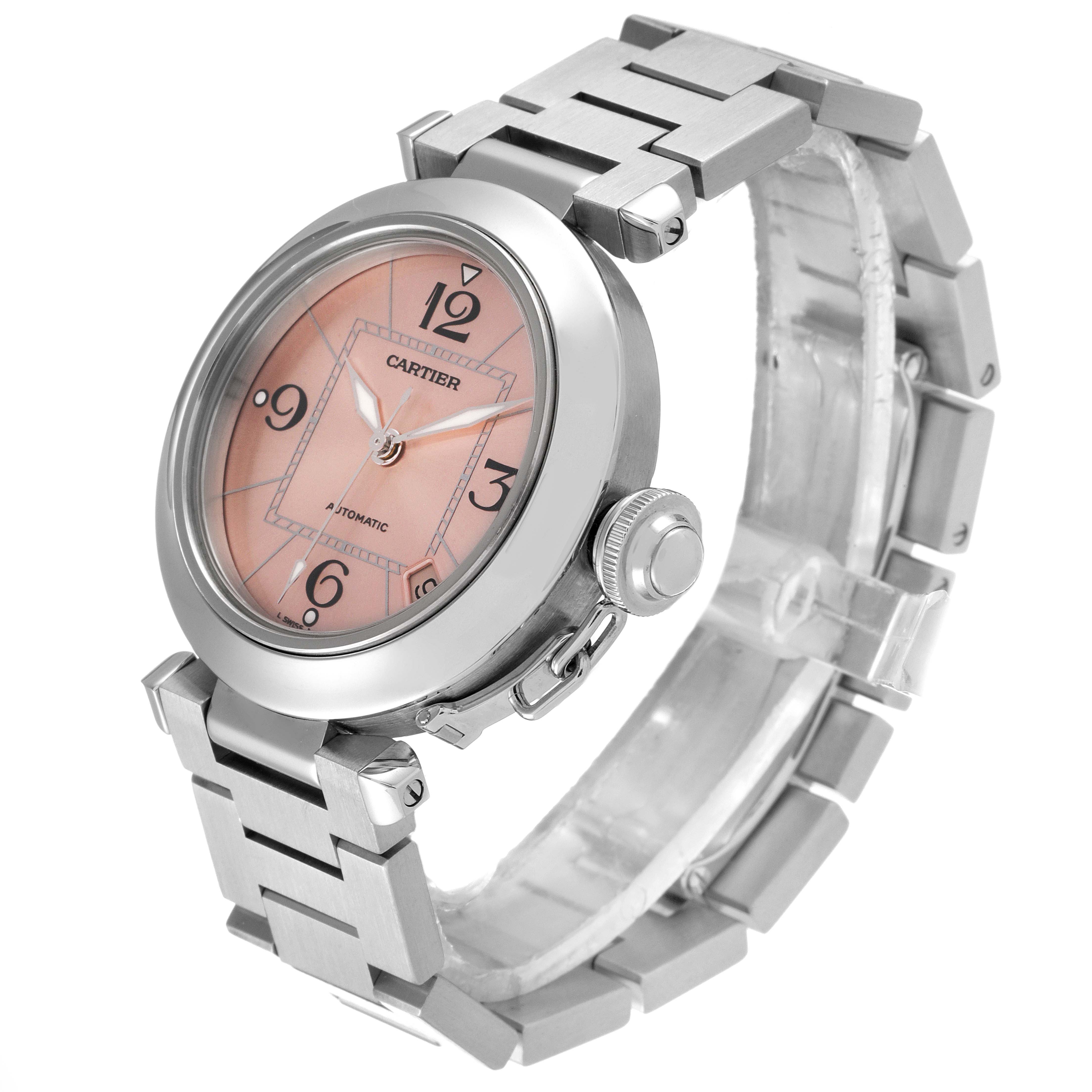 The image shows a Cartier Pasha W31075M7 Women's Stainless Steel Pink Dial W31075M7 Women's Stainless Steel Pink Dial model watch from an angled side view, highlighting the face, crown, and metal bracelet.