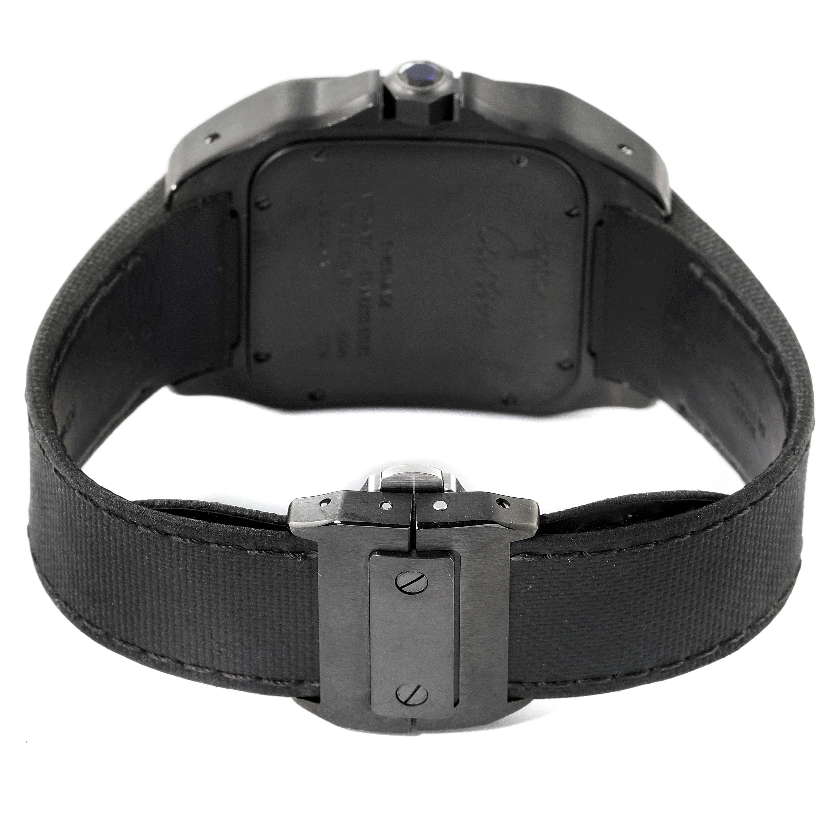The image shows the back view of a Santos model watch by Cartier, highlighting the case back, strap, and clasp.