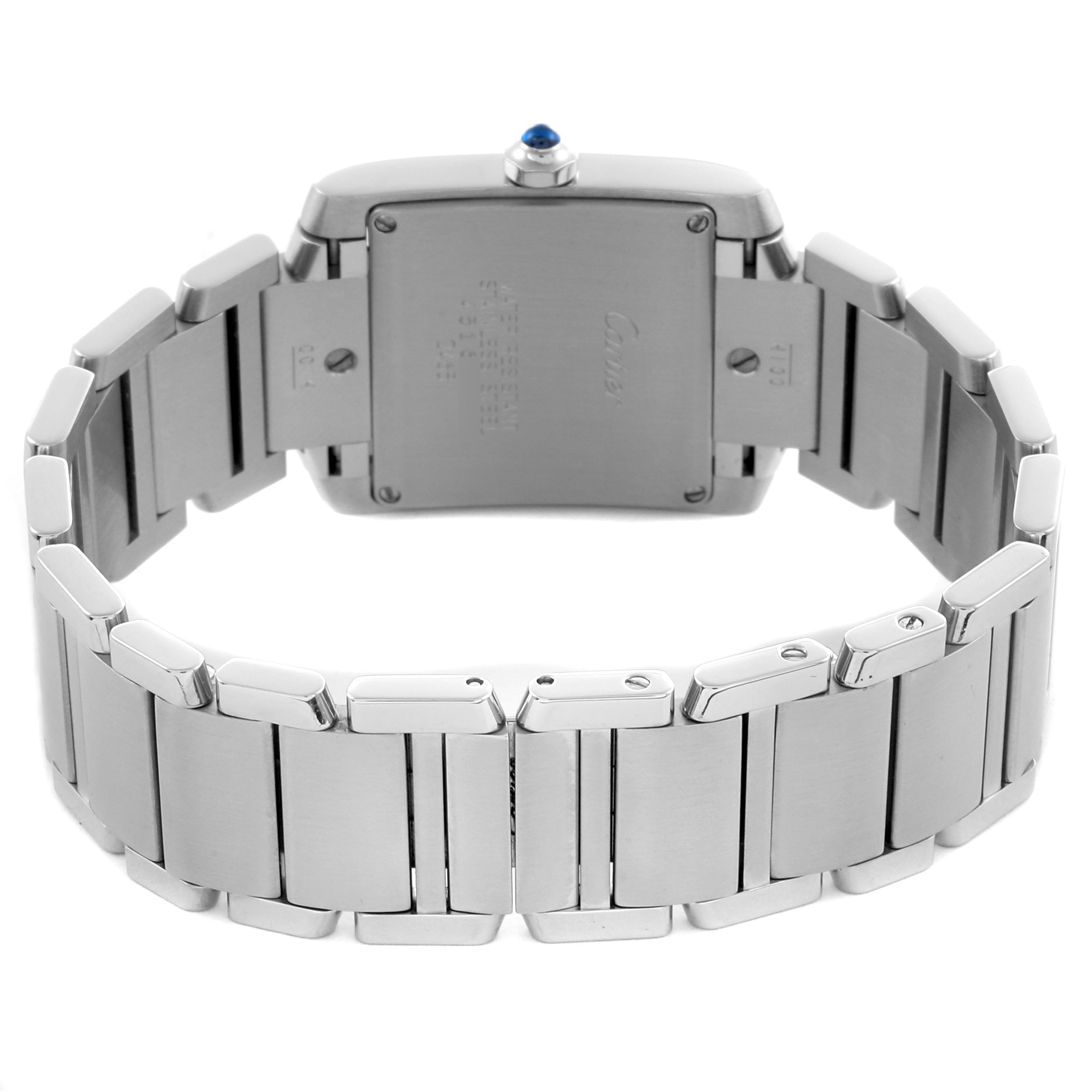 The Cartier Tank Francaise W51011Q3 Women's Stainless Steel Silver Dial W51011Q3 Women's Stainless Steel Silver Dial watch is shown from the back, highlighting the case back and metal bracelet.