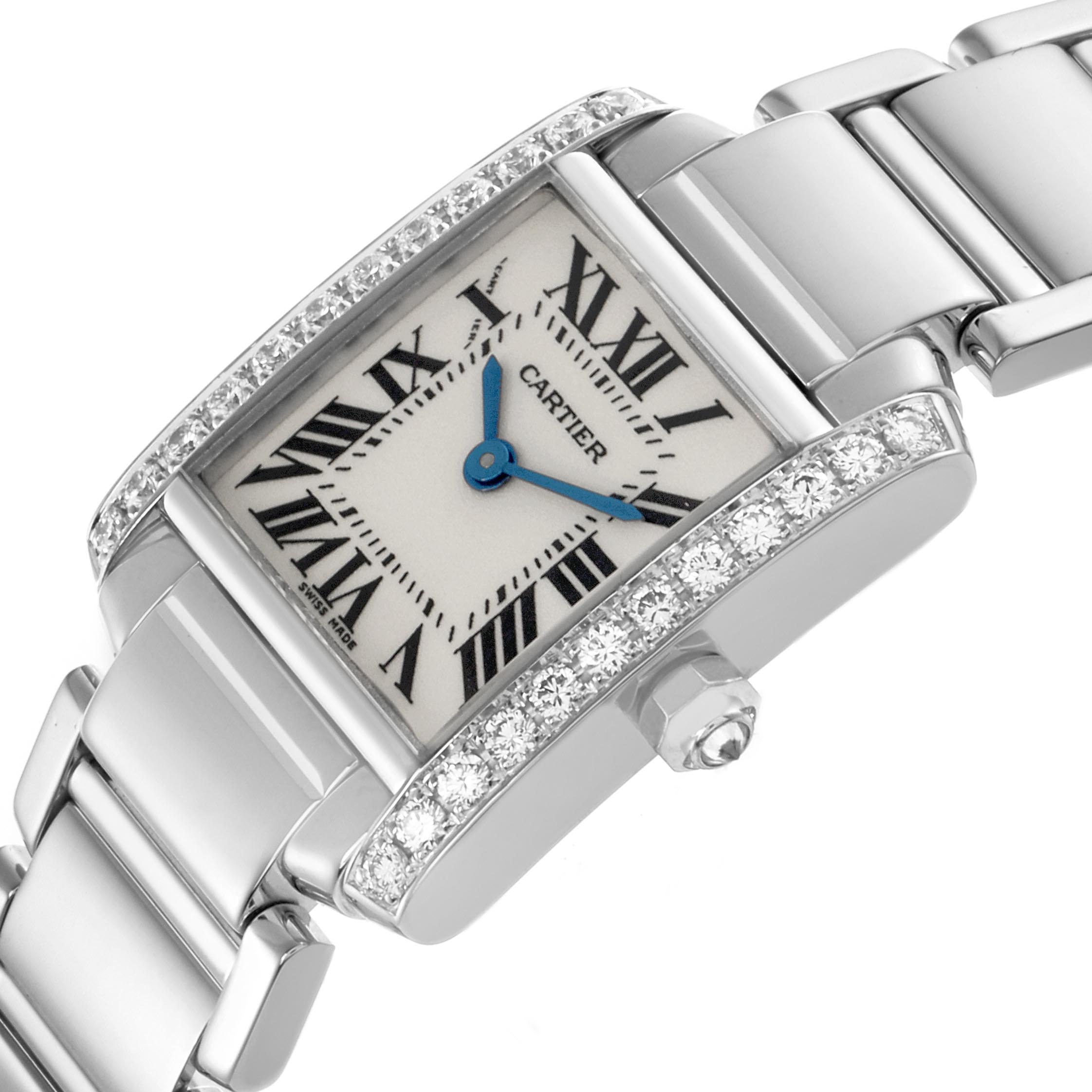 The Cartier Tank Francaise WE1002S3 Women's White Gold Silver Dial WE1002S3 Women's White Gold Silver Dial watch is shown at an angle highlighting the face, bezel with diamonds, and a portion of the bracelet.