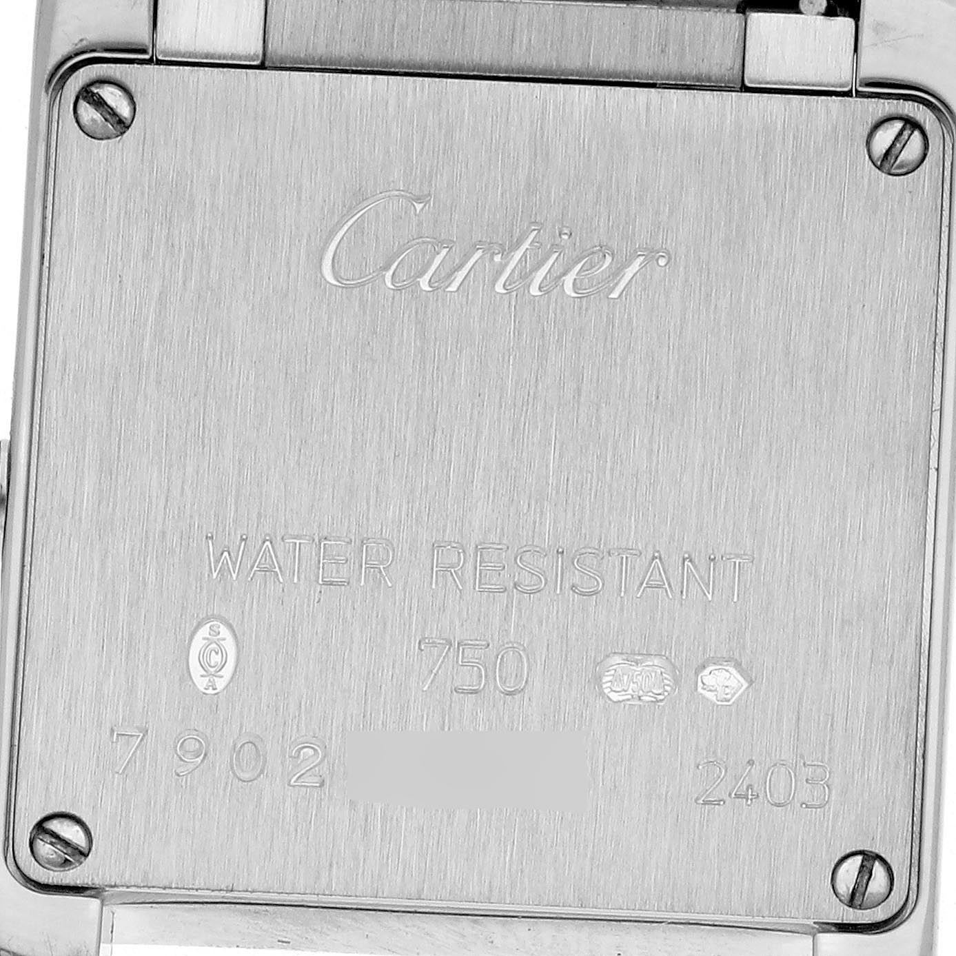 The image shows the back of a Cartier Tank Française watch, highlighting branding and engravings.