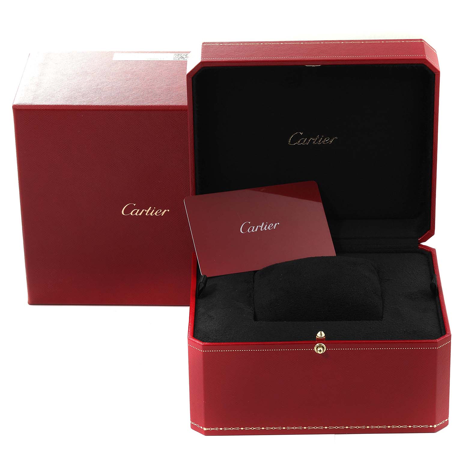 This image shows the box and packaging of a Tortue model by Cartier, with the open box, cushion, and card visible.