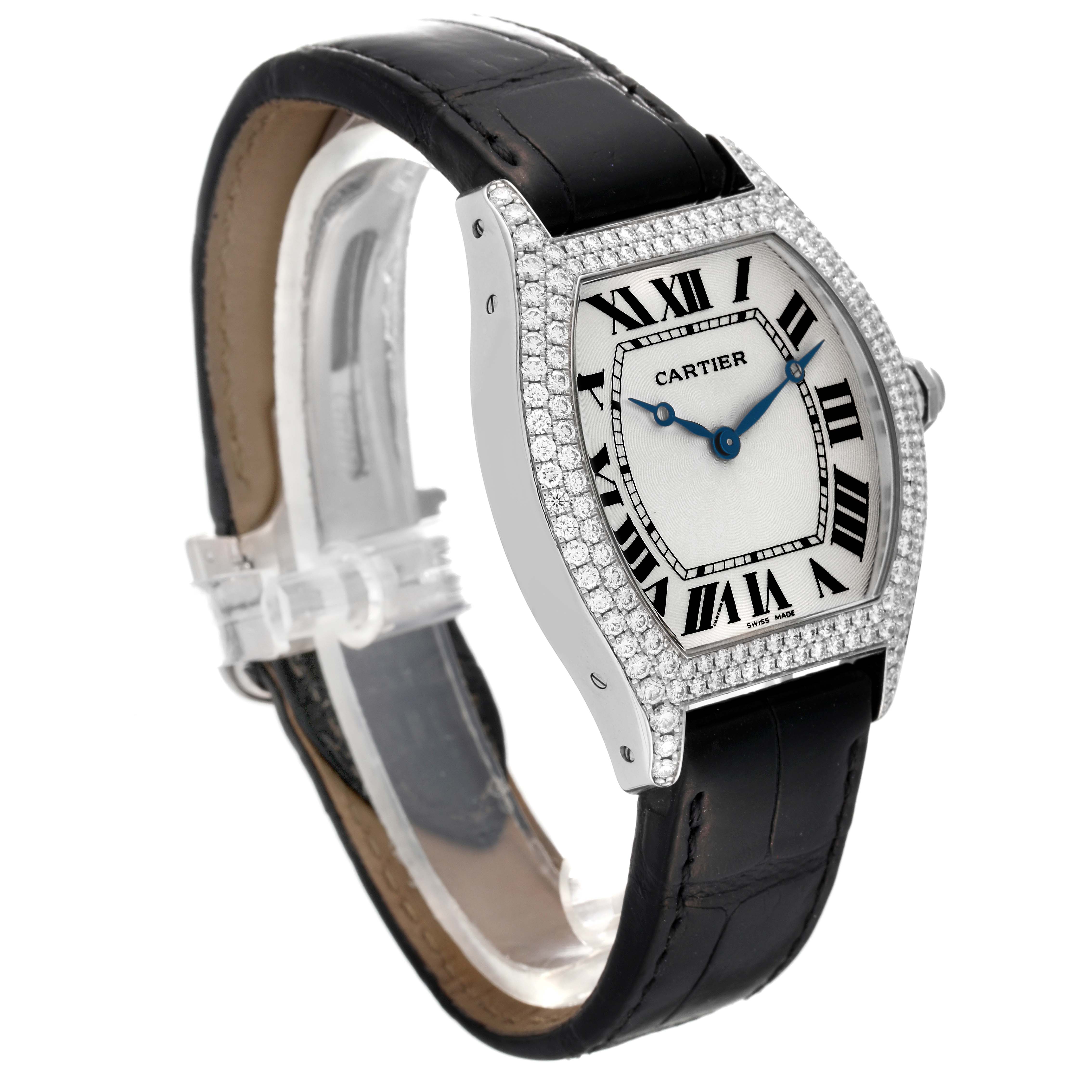 The Cartier Tortue WA503851 Men's White Gold Silver Dial WA503851 Men's White Gold Silver Dial watch is shown at a three-quarter angle, displaying its diamond bezel, Roman numeral dial, and black leather strap.