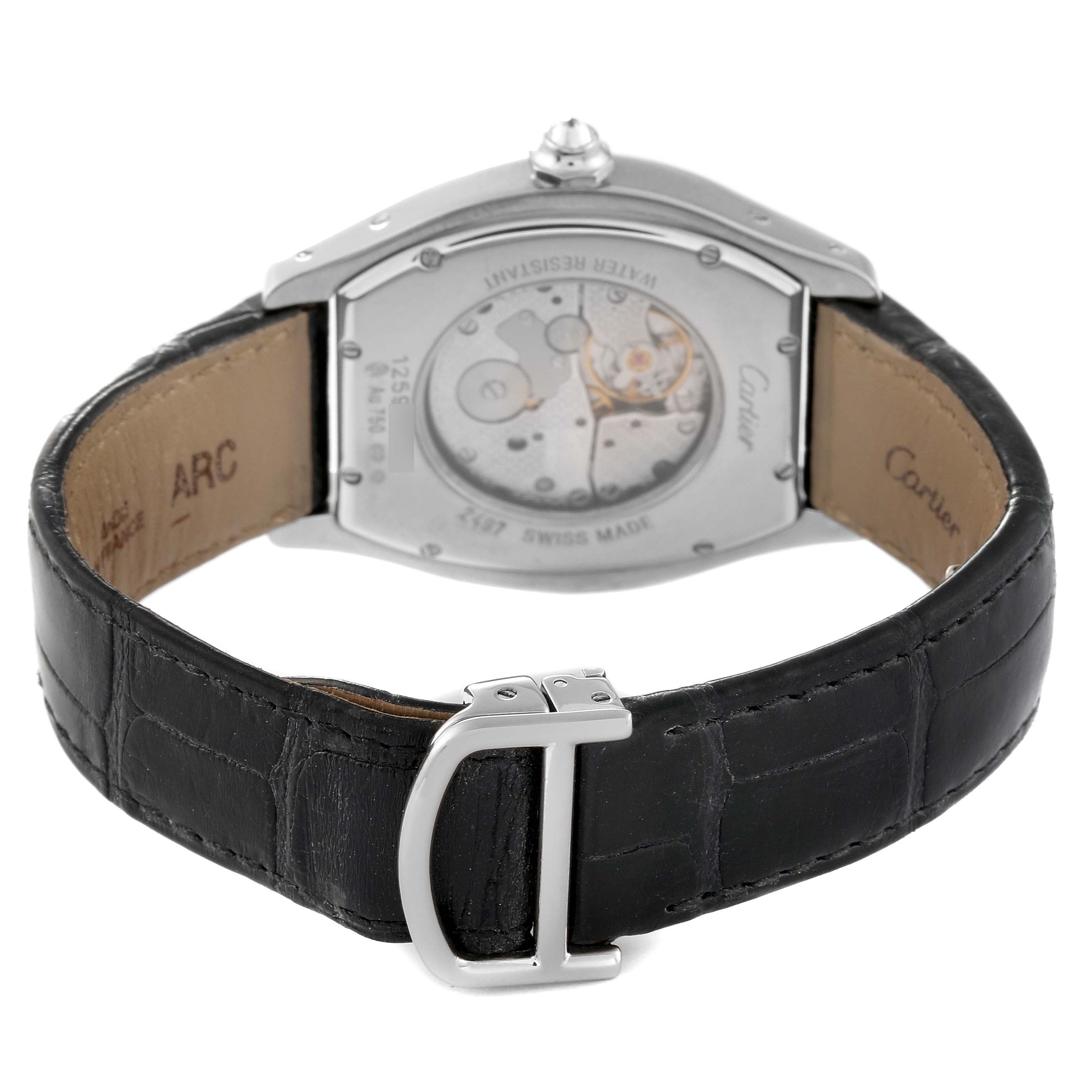The image shows the back view of a Cartier Tortue WA503851 Men's White Gold Silver Dial WA503851 Men's White Gold Silver Dial watch, highlighting its movement, case back, and leather strap with a buckle.