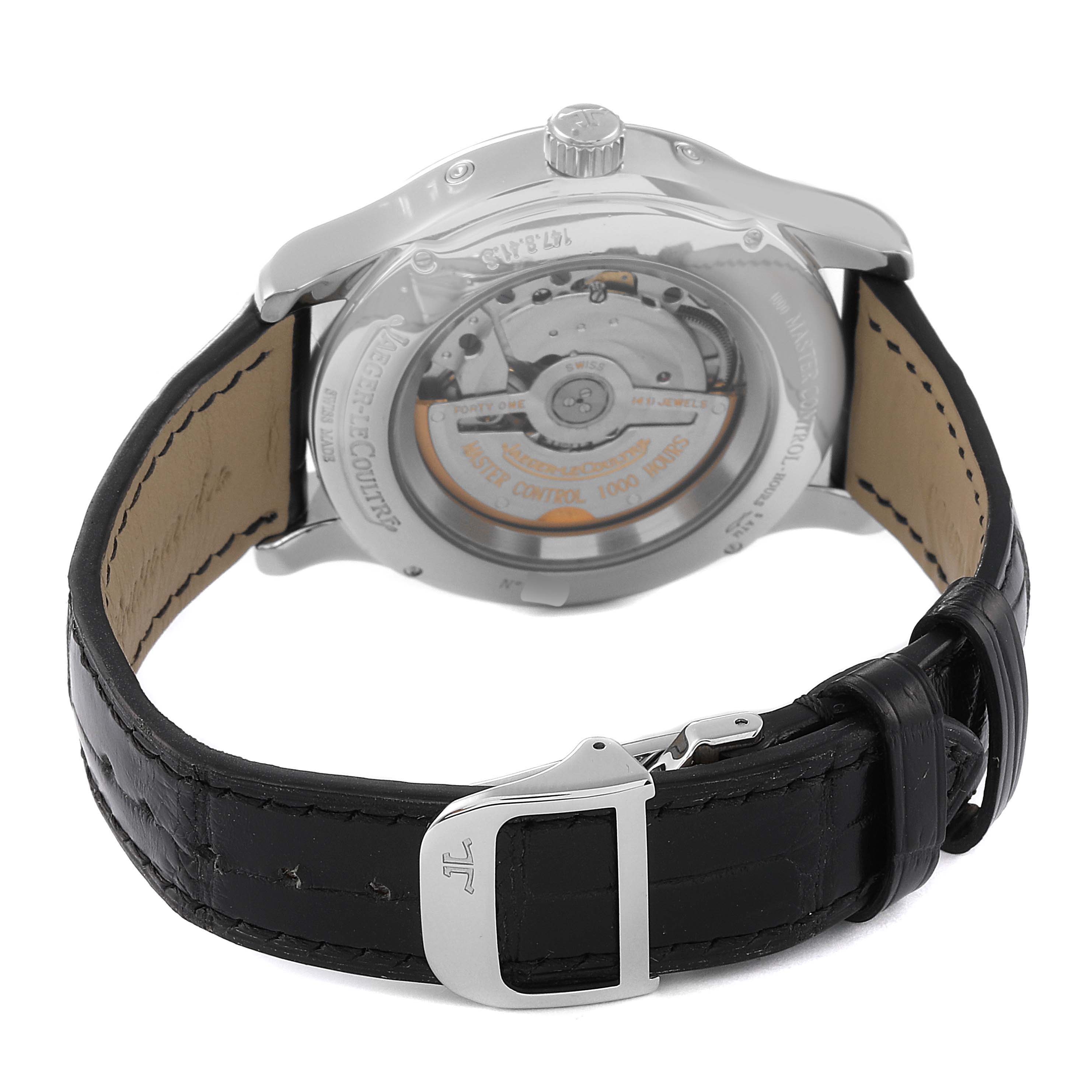 The image shows the back view of a Jaeger-LeCoultre Master model watch, highlighting its movement and leather strap with buckle.