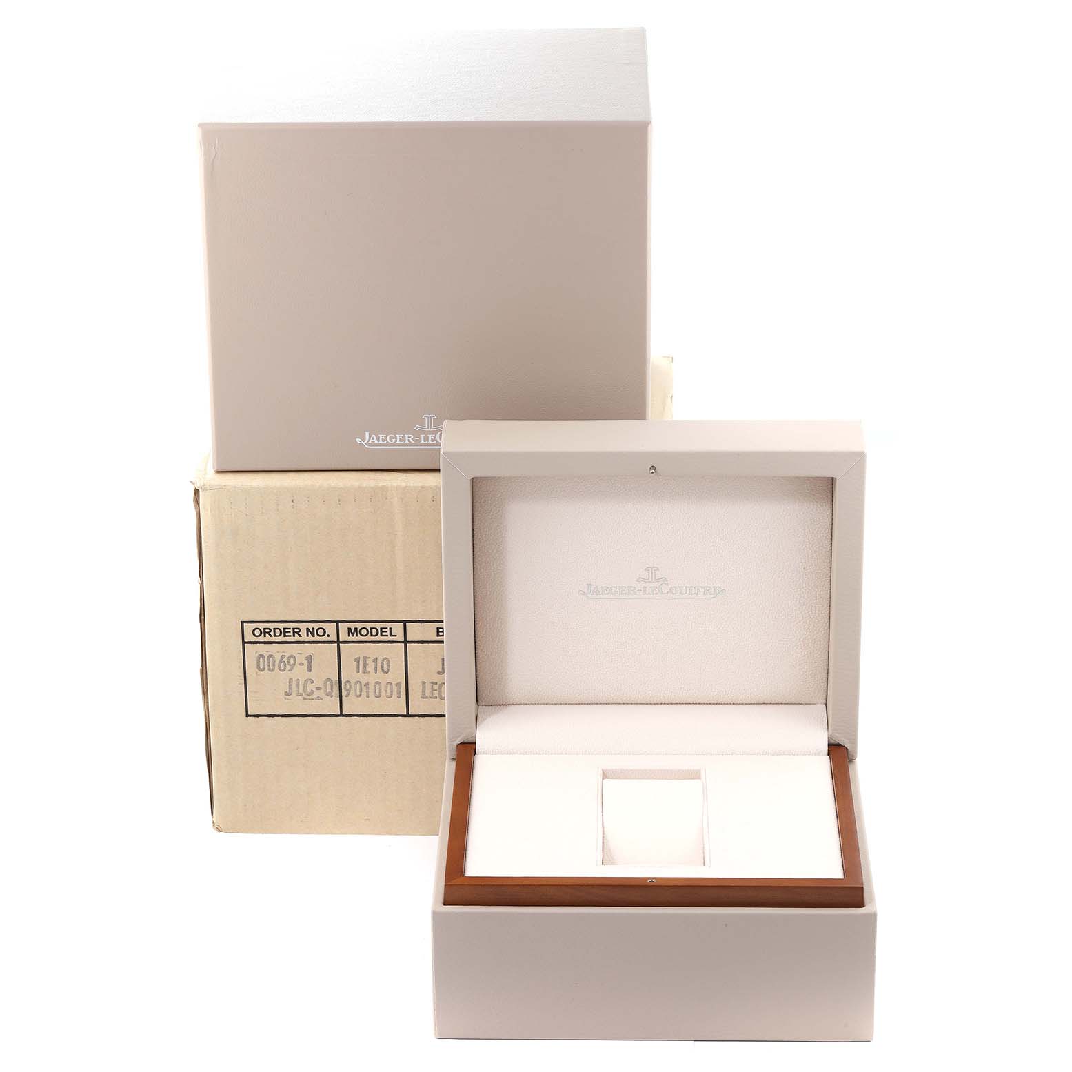 The image shows the open presentation box and packaging for a Jaeger-LeCoultre Master model watch from a front angle.