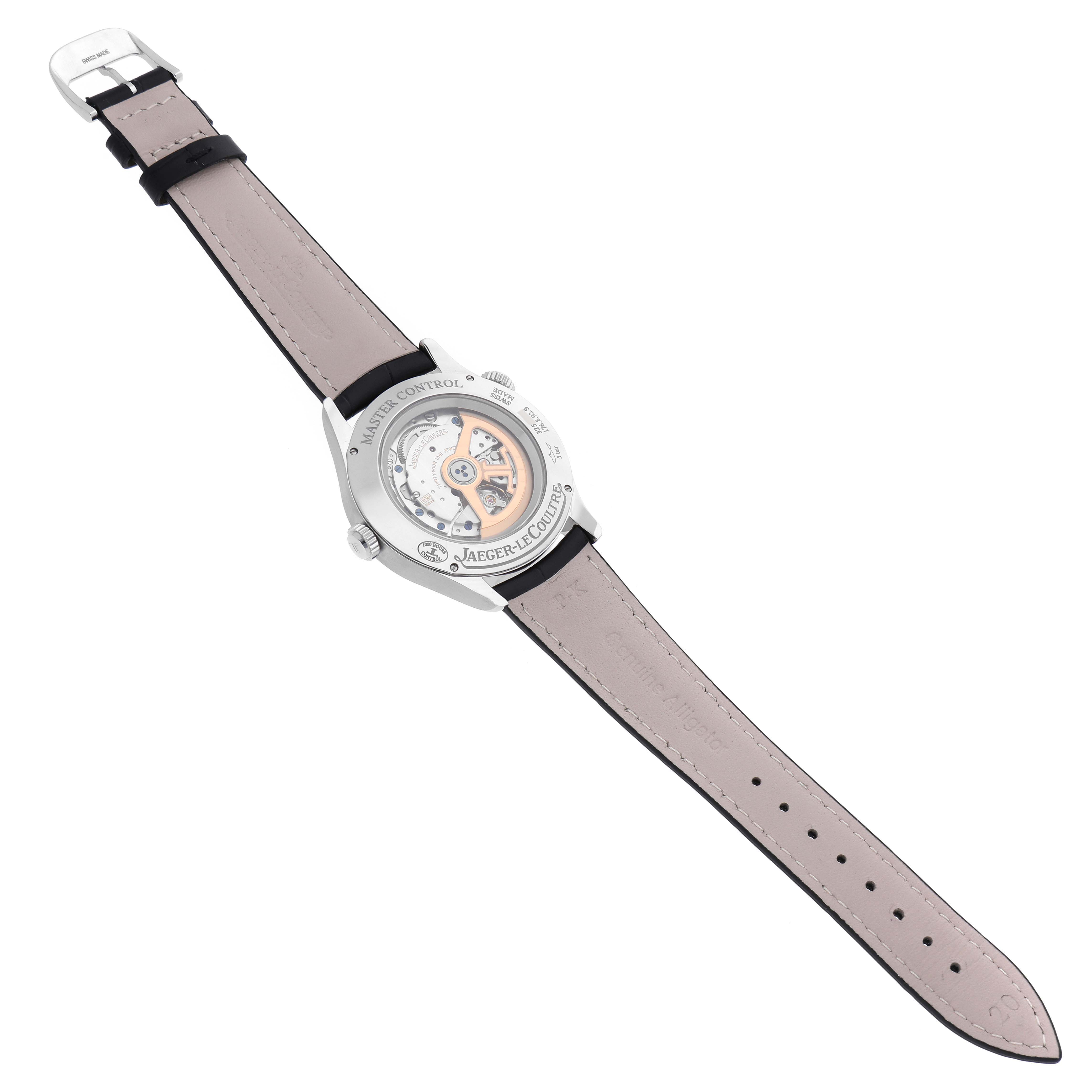 The image shows the back view of the Jaeger LeCoultre Master Q1428530 Men's Stainless Steel Silver Dial Q1428530 Men's Stainless Steel Silver Dial model watch, displaying its movement and leather strap.