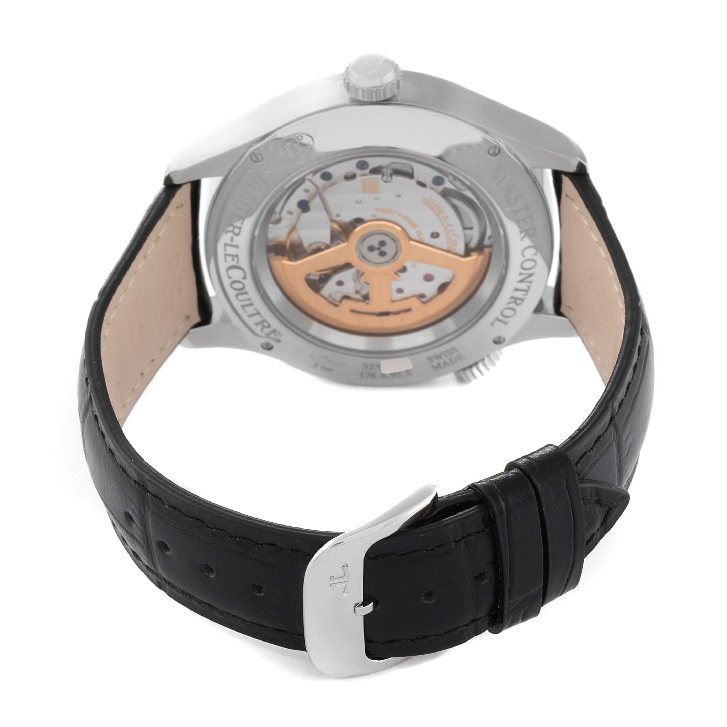 The image shows the back view of a Jaeger LeCoultre Master Q1428530 Men's Stainless Steel Silver Dial Q1428530 Men's Stainless Steel Silver Dial model watch, highlighting its movement and black leather strap.
