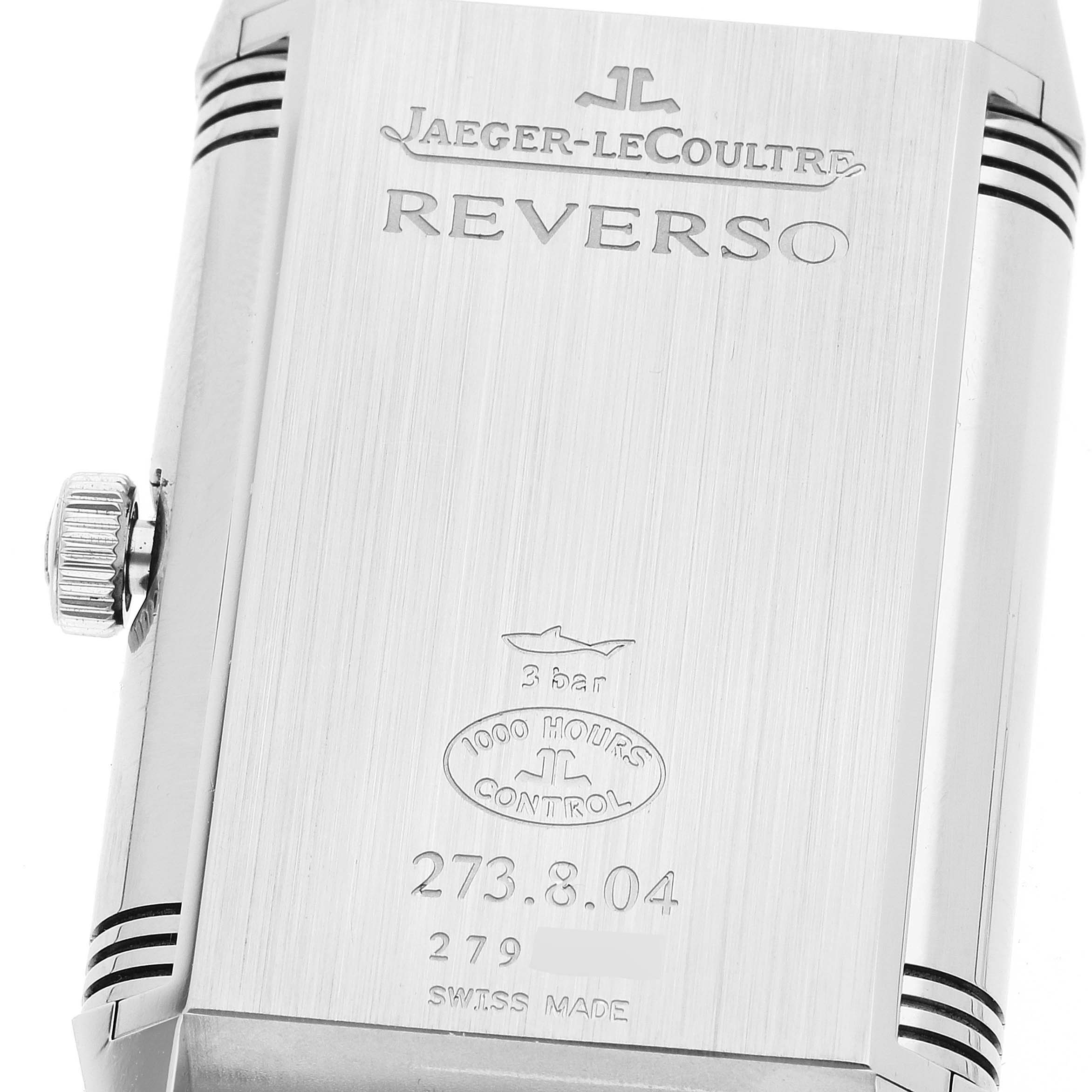 The image shows the reverse side of a Jaeger LeCoultre Reverso Q3738420 Men's Stainless Steel Silver Dial Q3738420 Men's Stainless Steel Silver Dial watch, highlighting the engraved details and crown.
