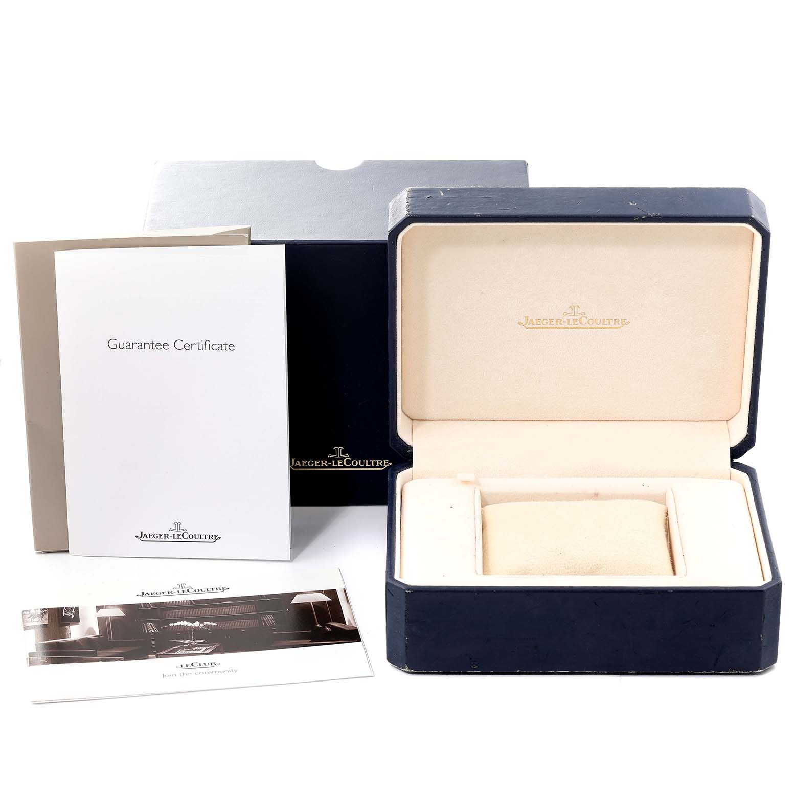 The image shows the Jaeger LeCoultre Reverso Q3738420 Men's Stainless Steel Silver Dial Q3738420 Men's Stainless Steel Silver Dial watch box, open, with a guarantee certificate and booklets next to it.